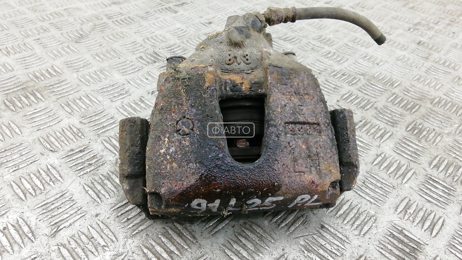 Суппорт тормозной передний левый