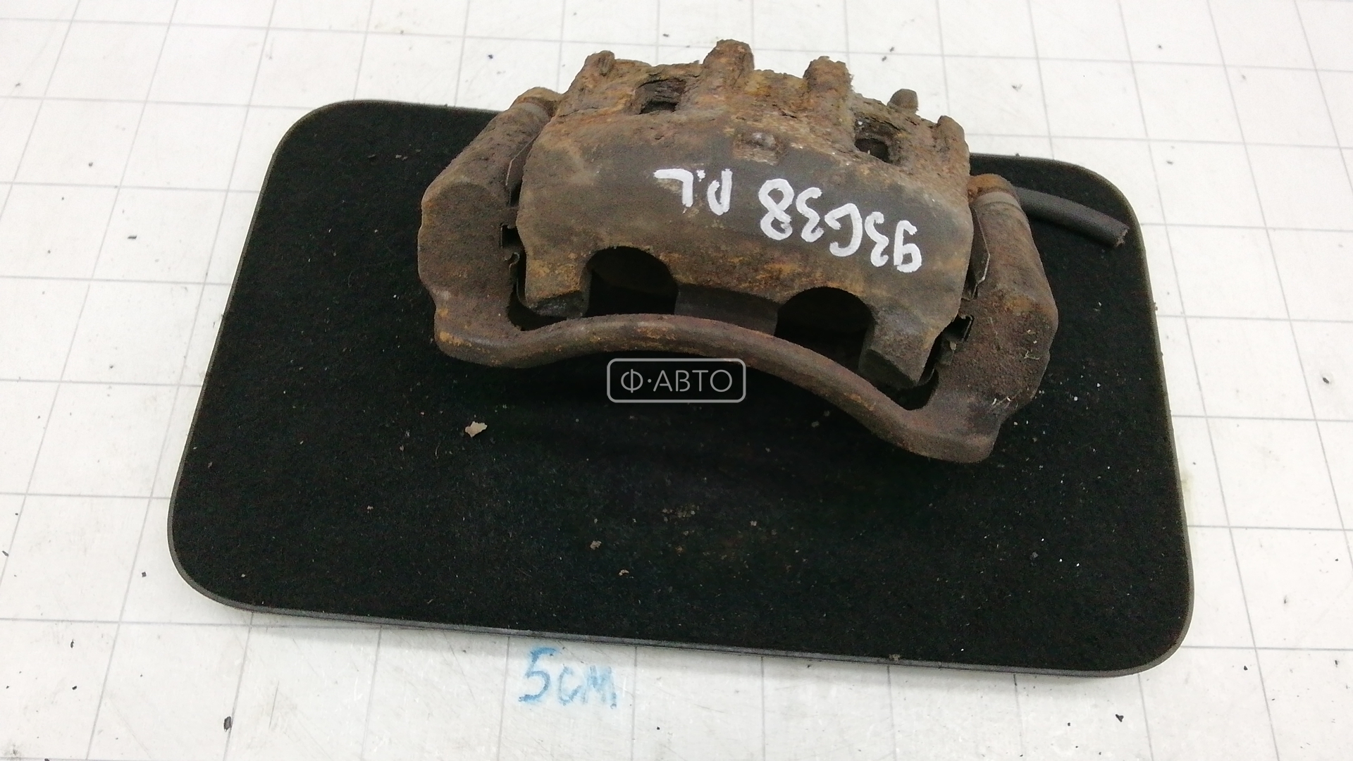 Суппорт тормозной передний левый