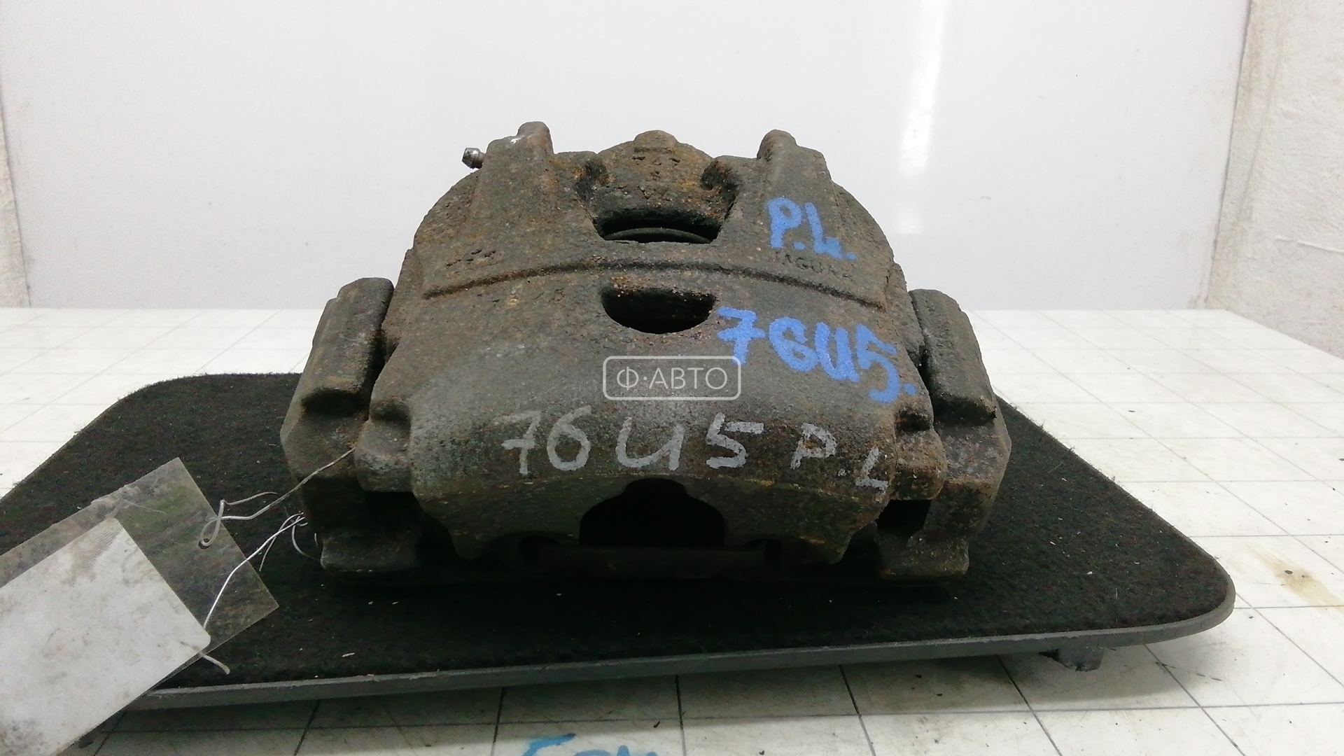 Суппорт тормозной передний левый