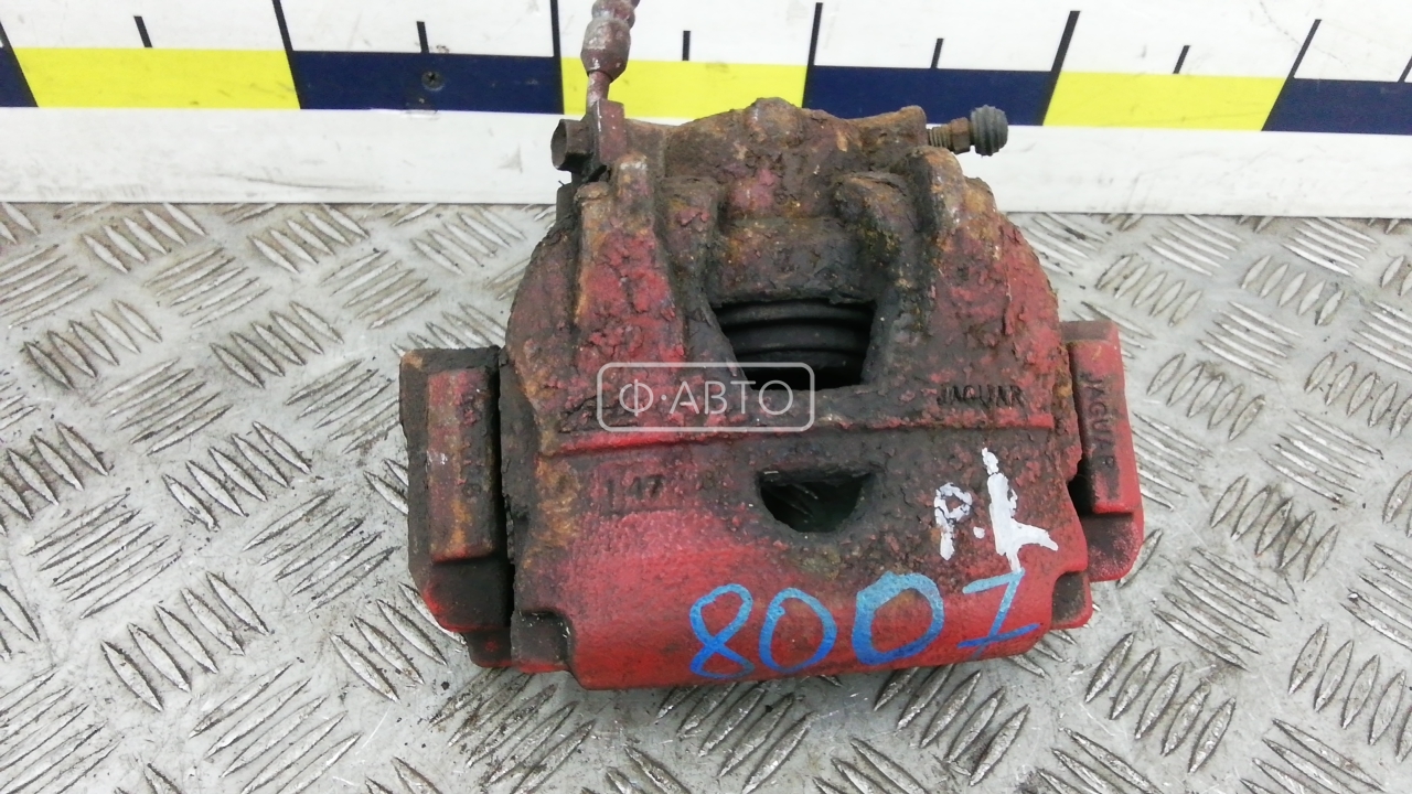 Суппорт тормозной передний левый