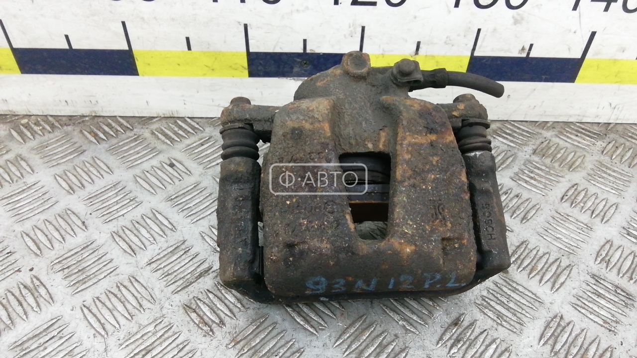 Суппорт тормозной передний левый