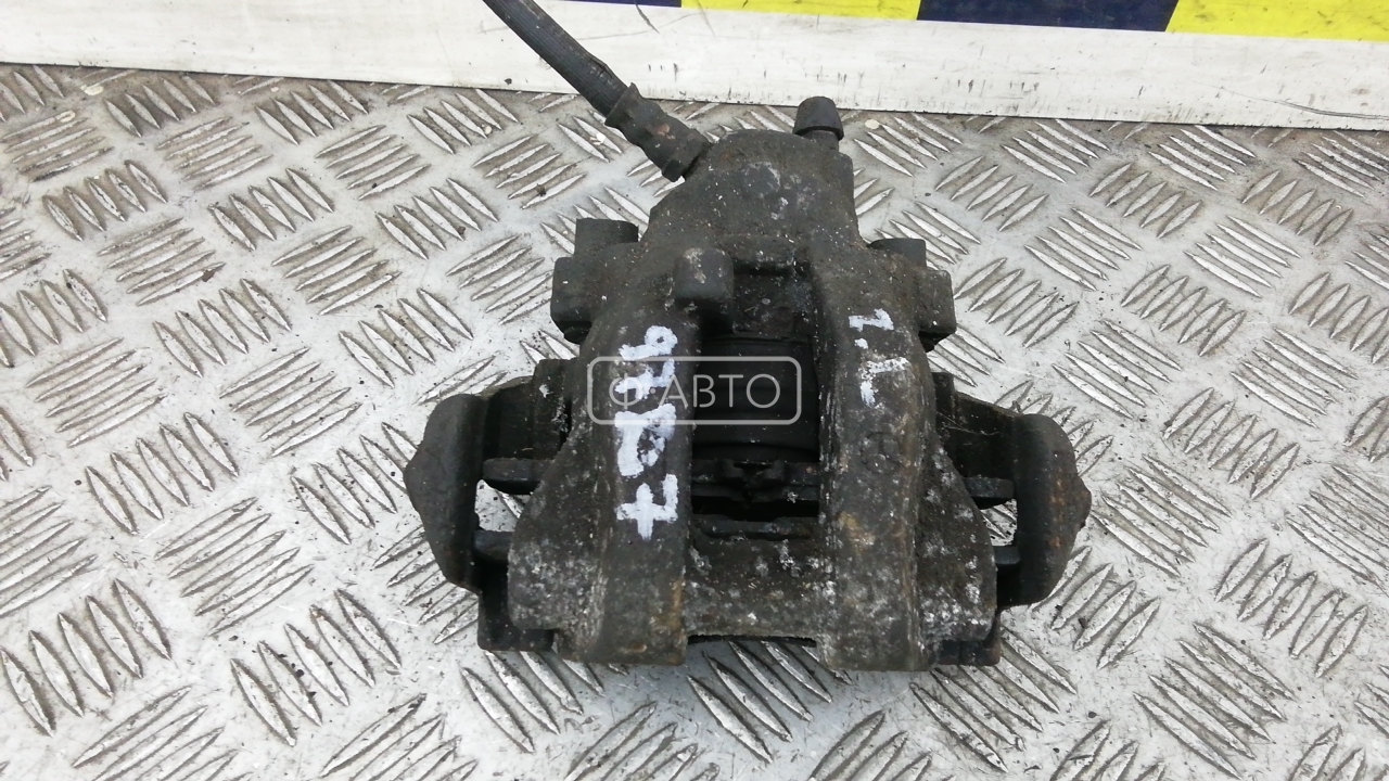 Суппорт тормозной задний левый