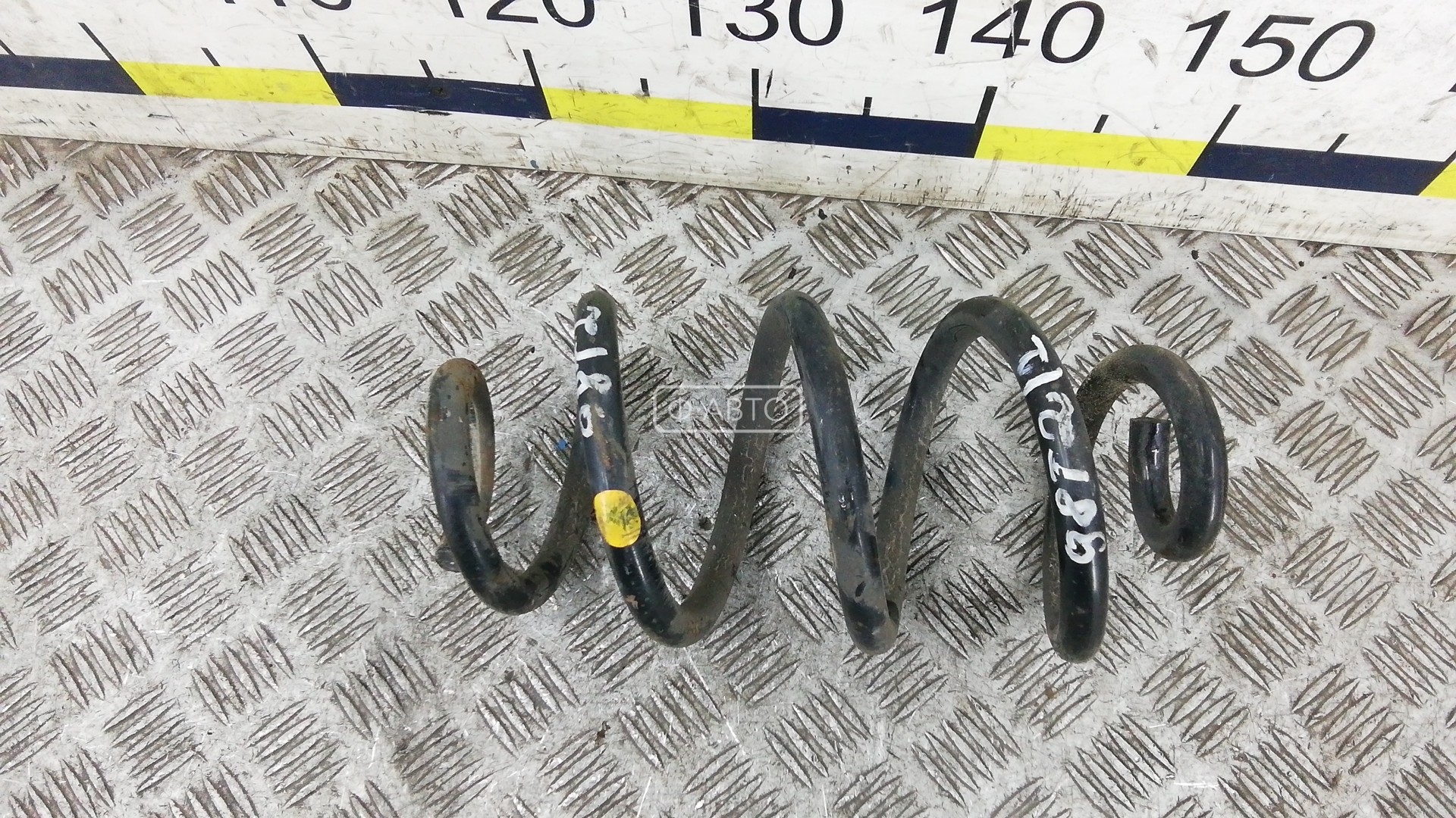 Пружина задняя