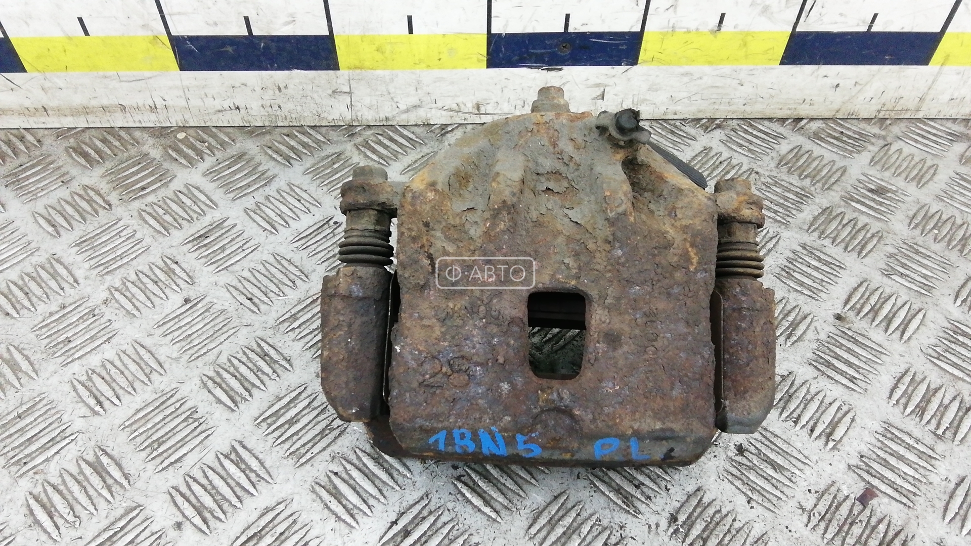 Суппорт тормозной передний левый