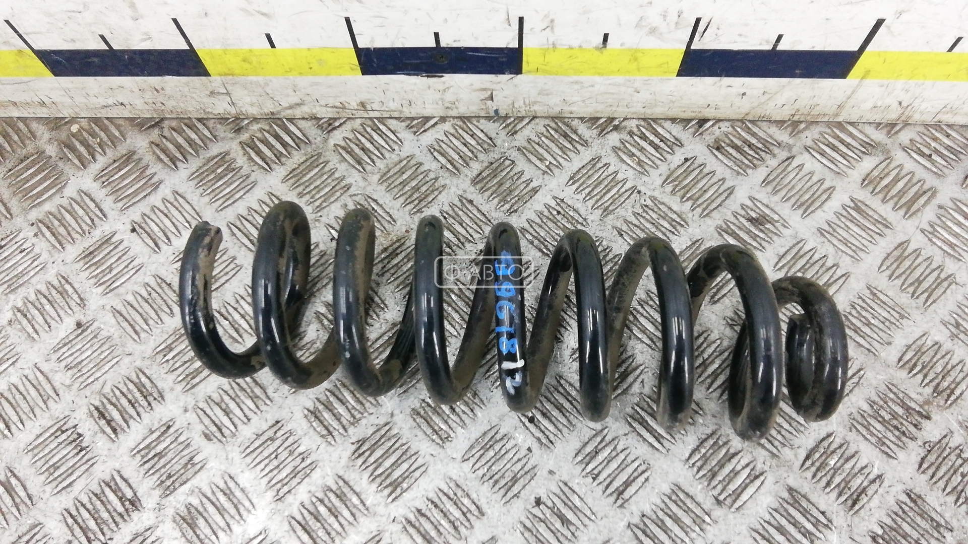 Пружина задняя