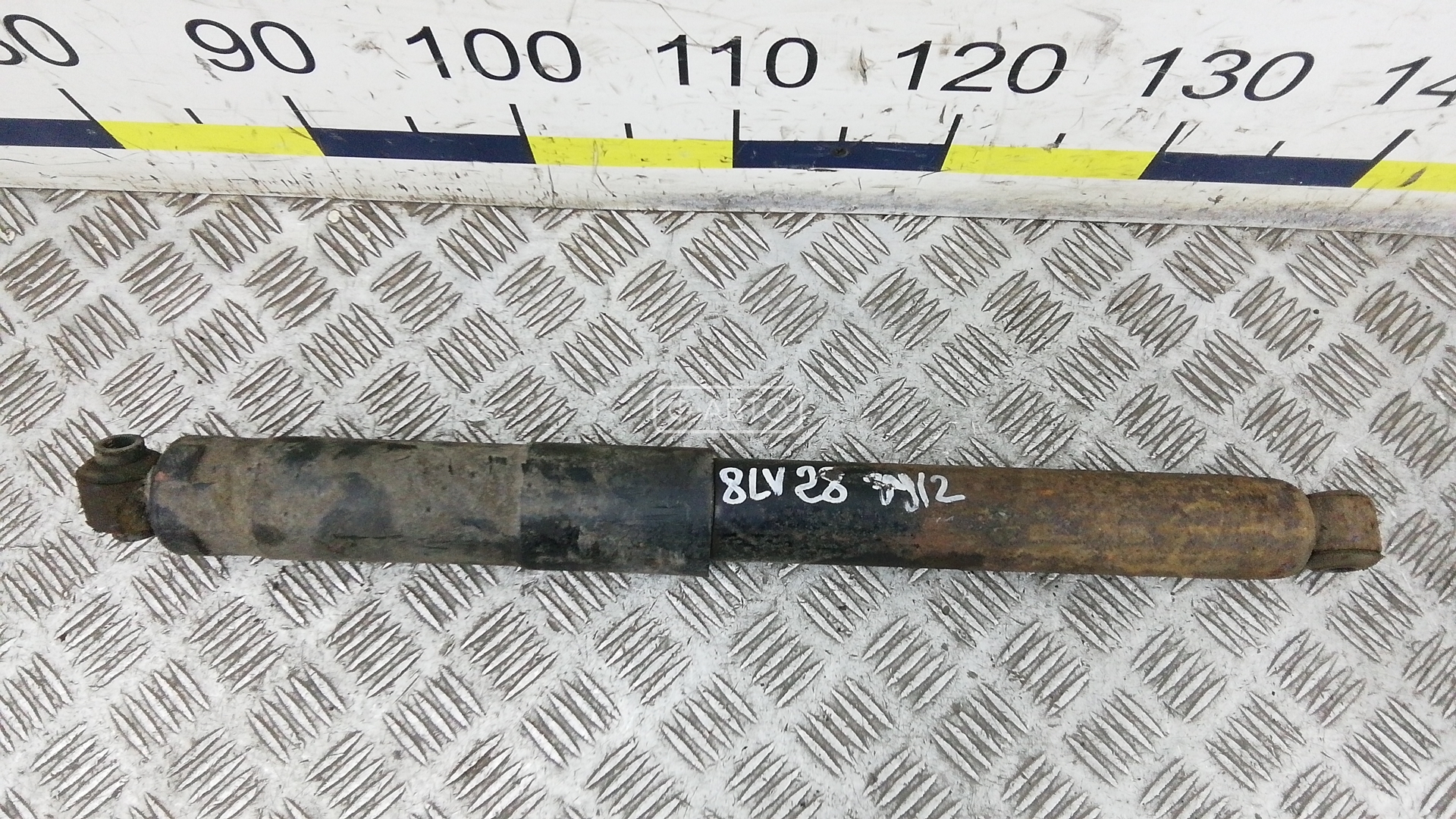 Амортизатор задней балки