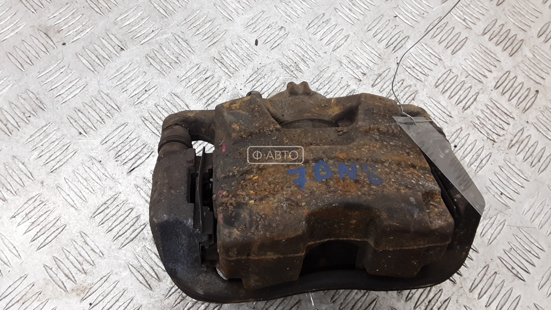 Суппорт тормозной передний левый