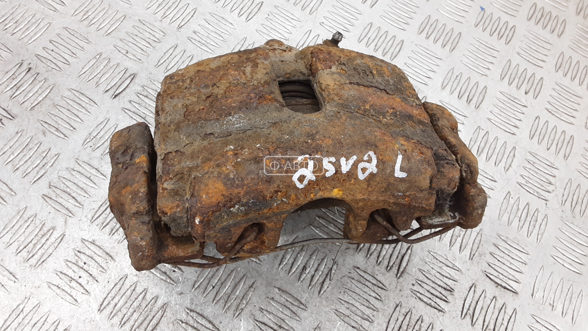 Суппорт тормозной передний левый