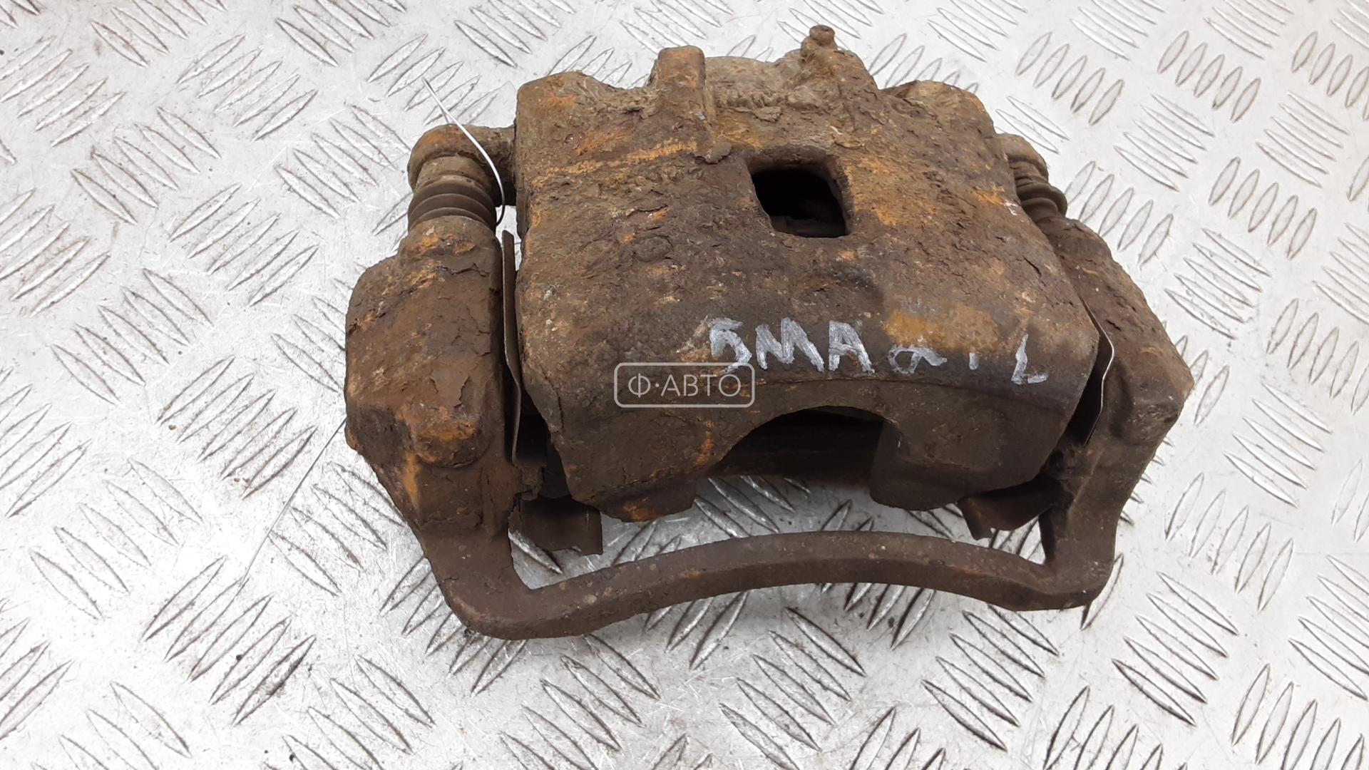 Суппорт тормозной передний левый