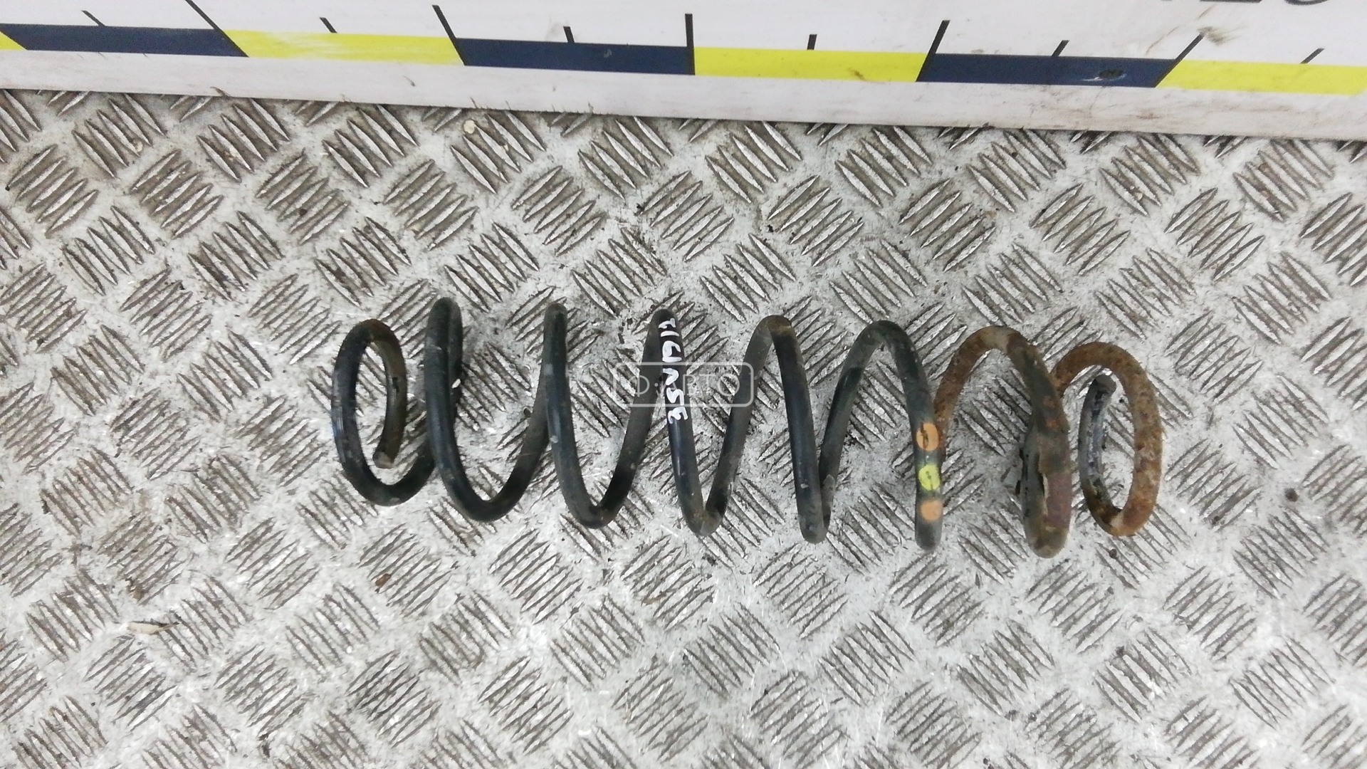 Пружина задняя