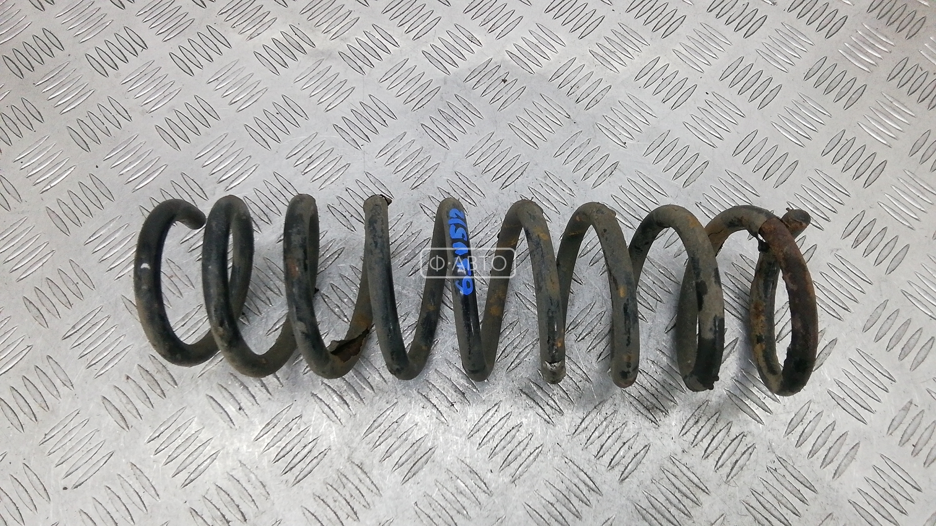 Пружина задняя