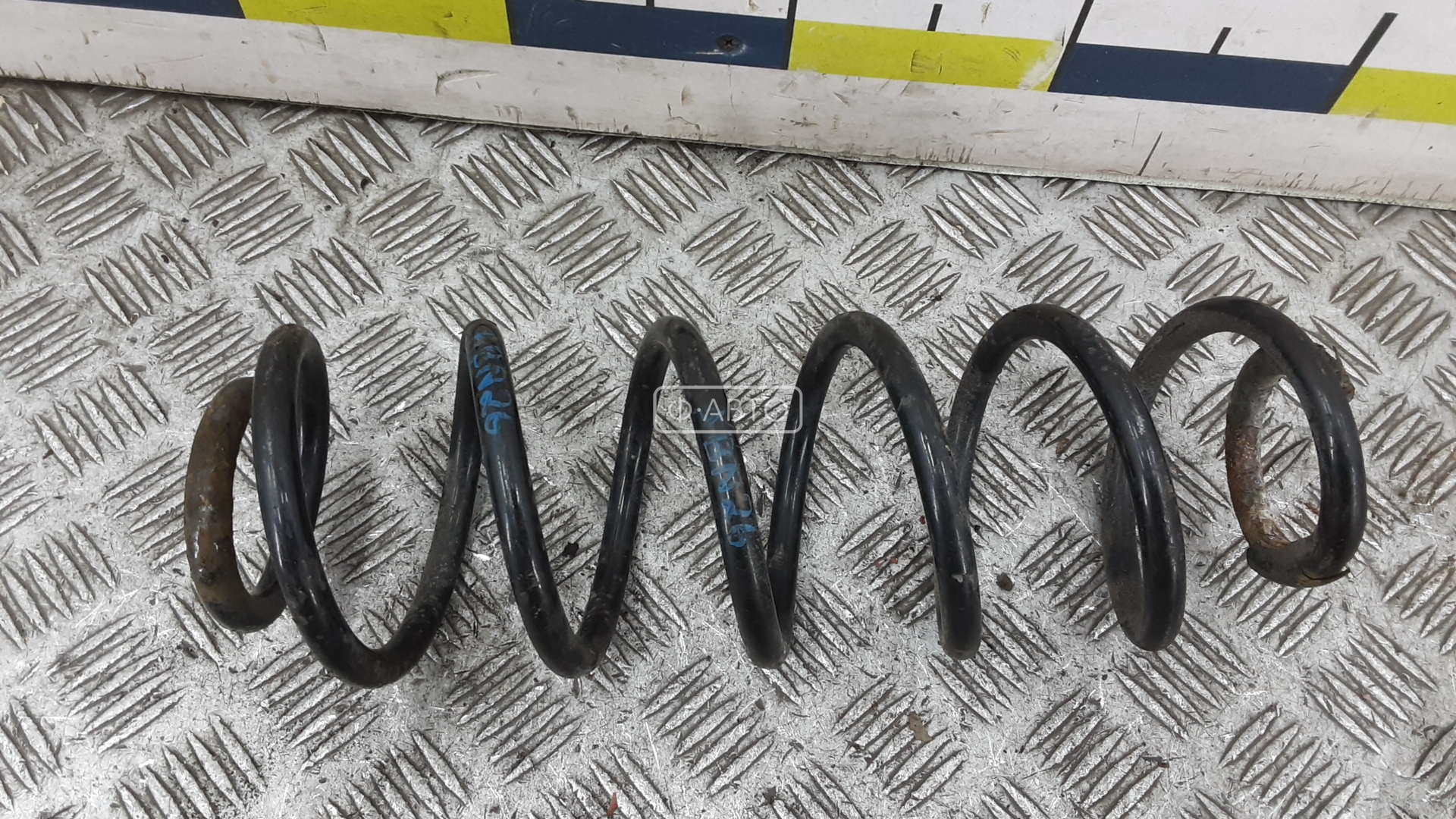 Пружина задняя