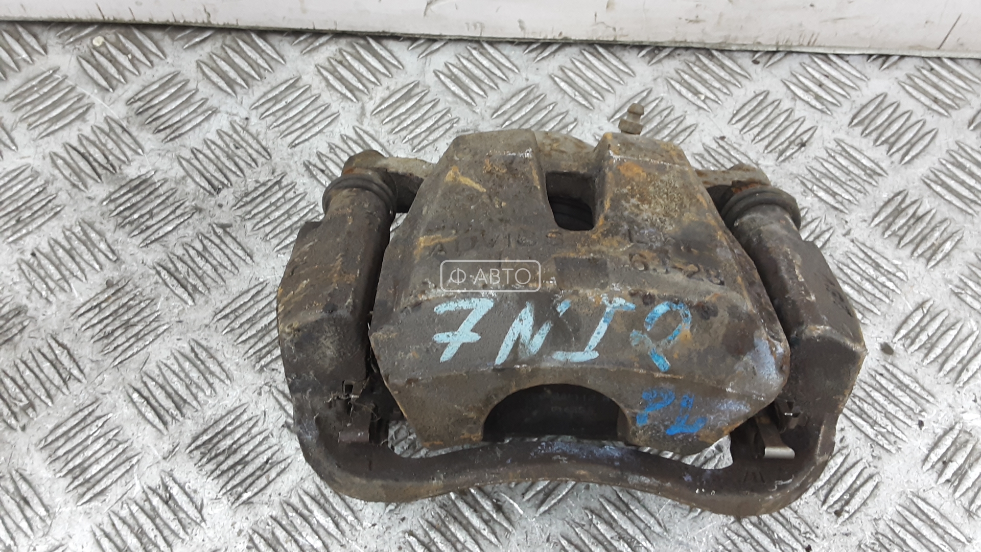 Суппорт тормозной передний левый