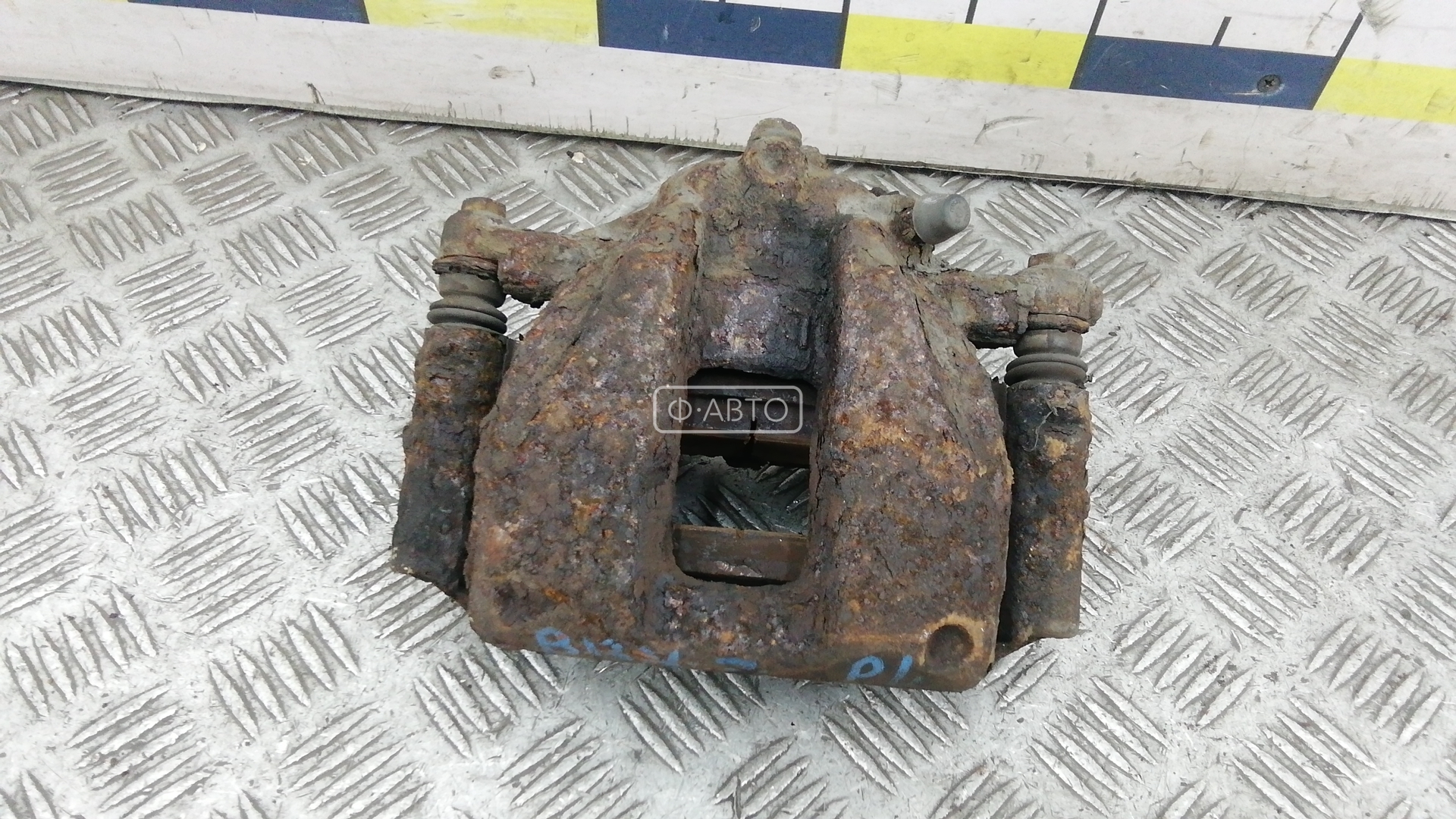 Суппорт тормозной передний левый