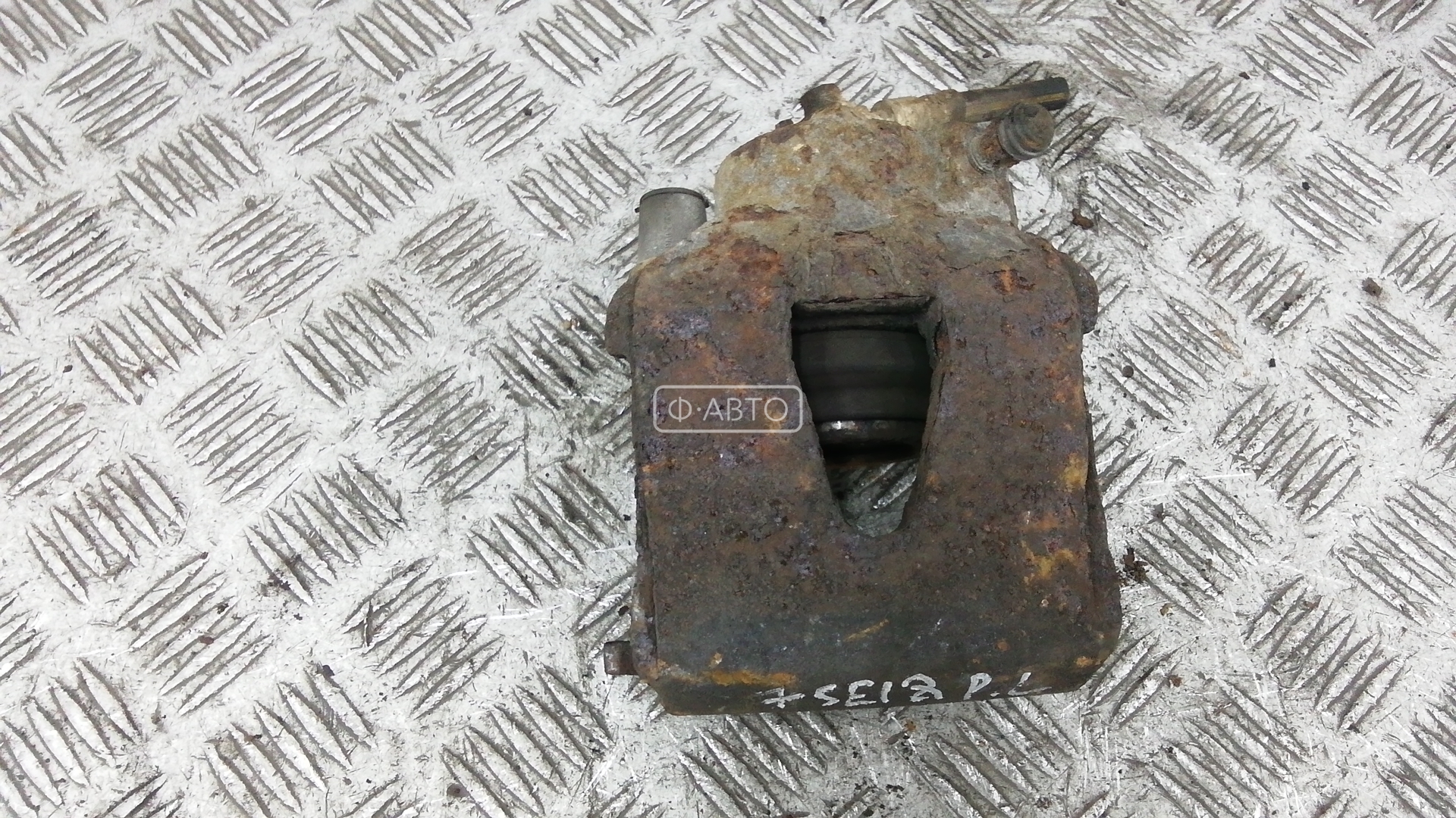 Суппорт тормозной передний левый