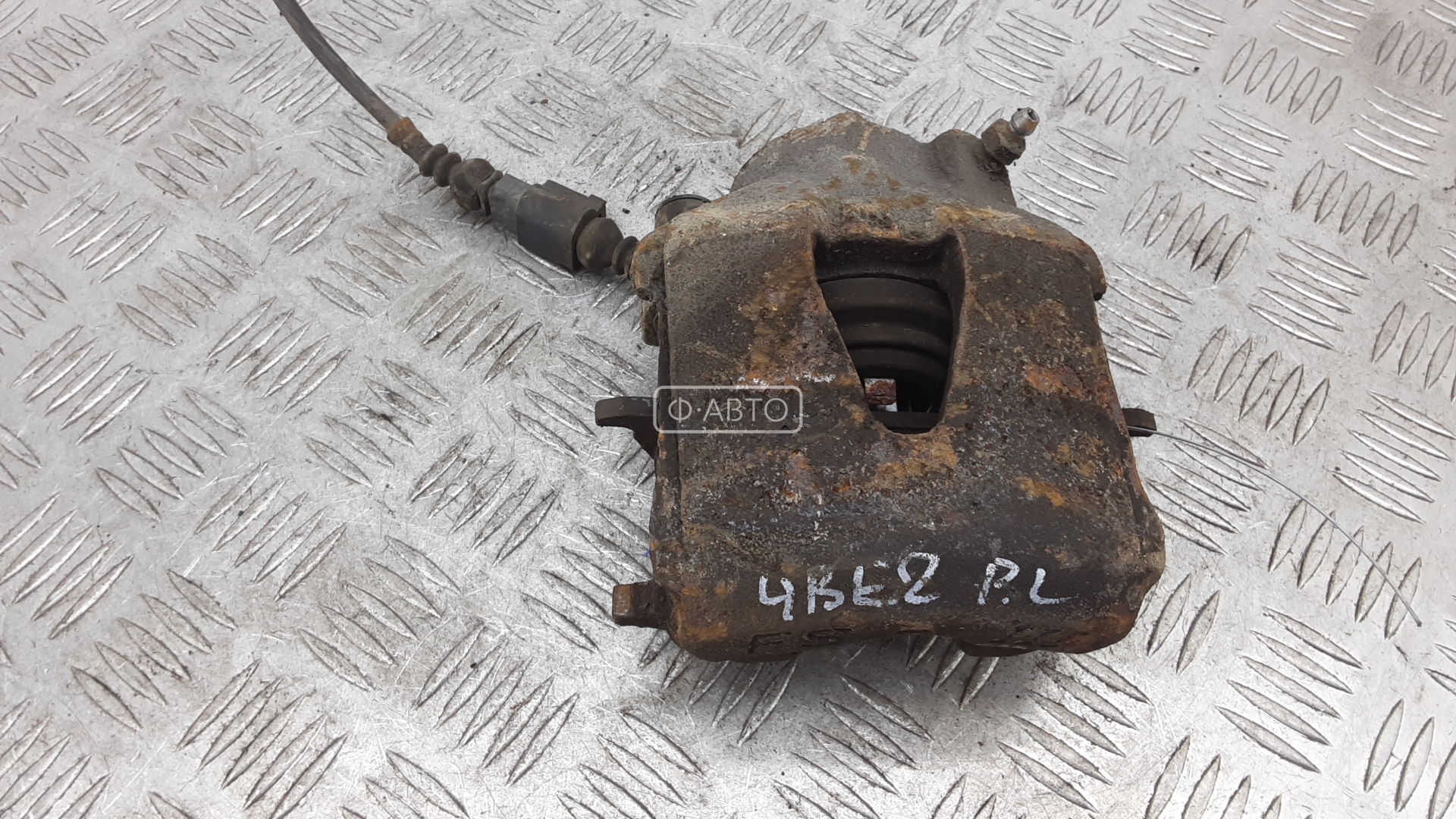 Суппорт тормозной передний левый