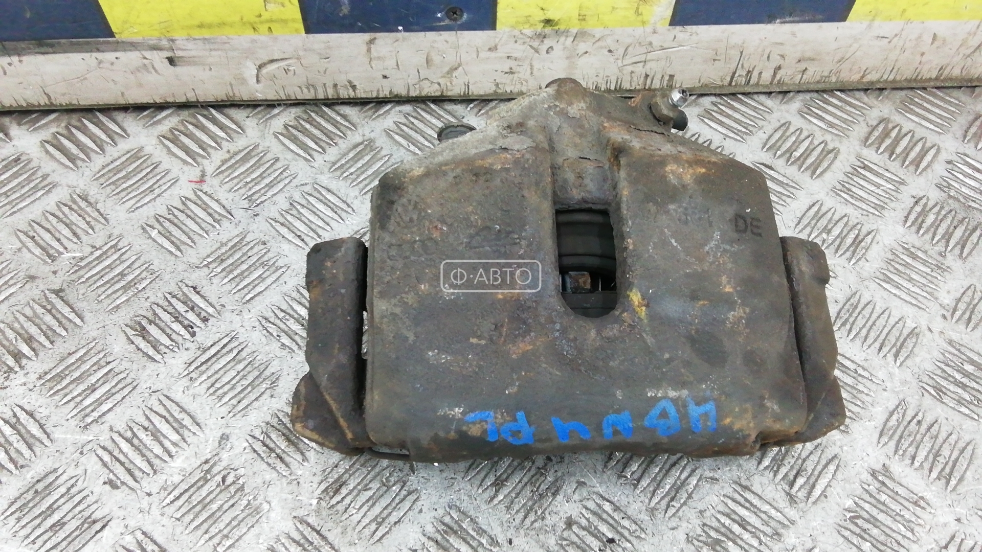 Суппорт тормозной передний левый