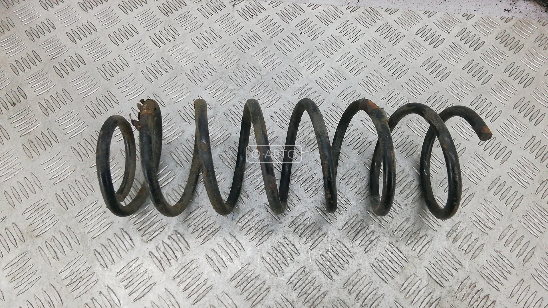Пружина задняя