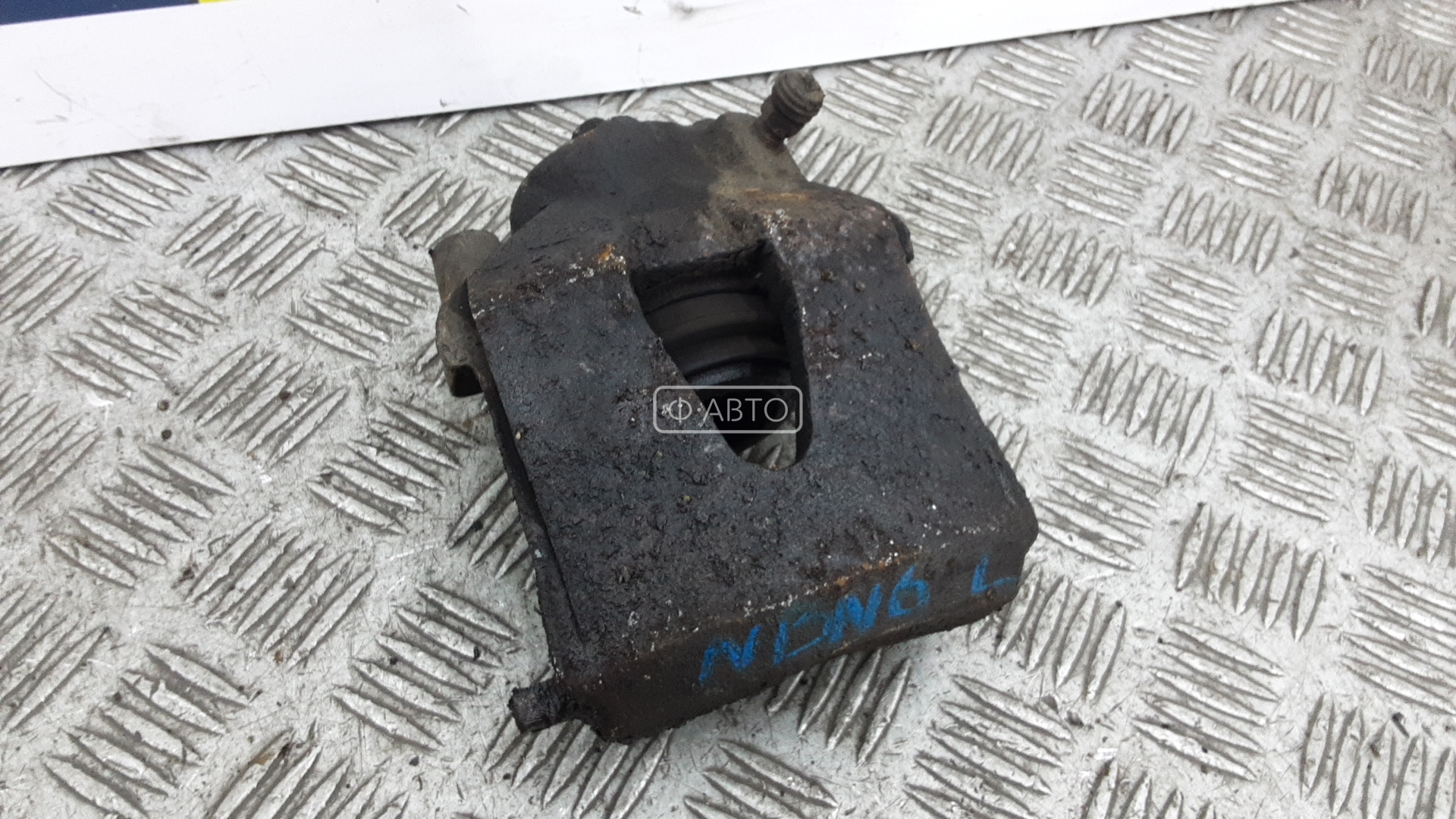 Суппорт тормозной передний левый