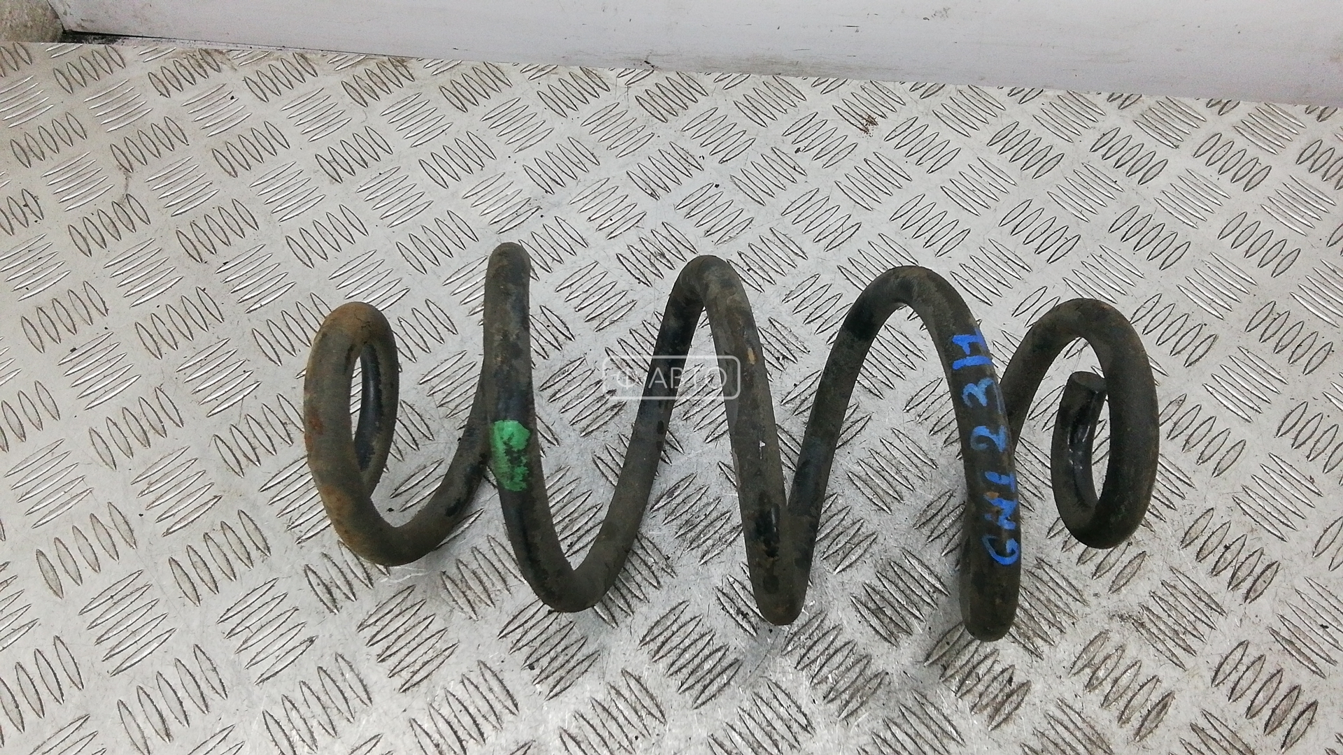 Пружина задняя