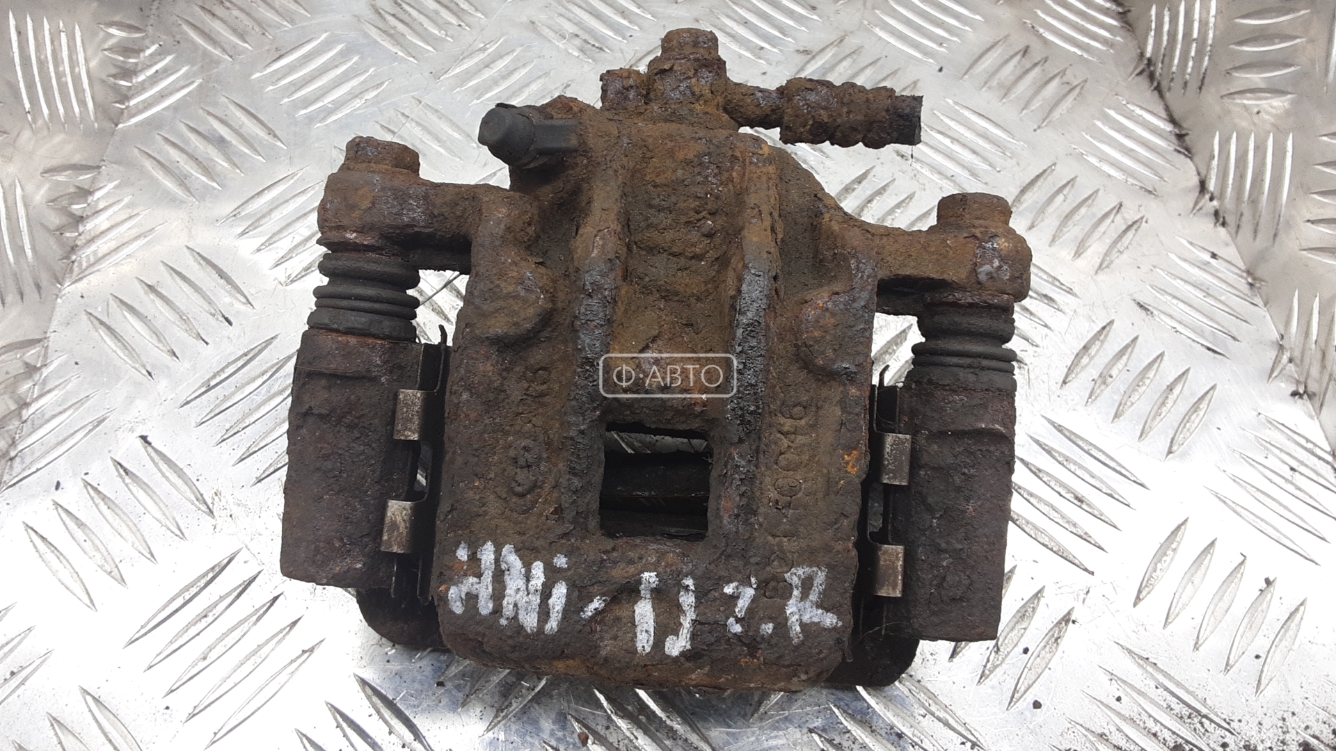 Суппорт тормозной задний правый