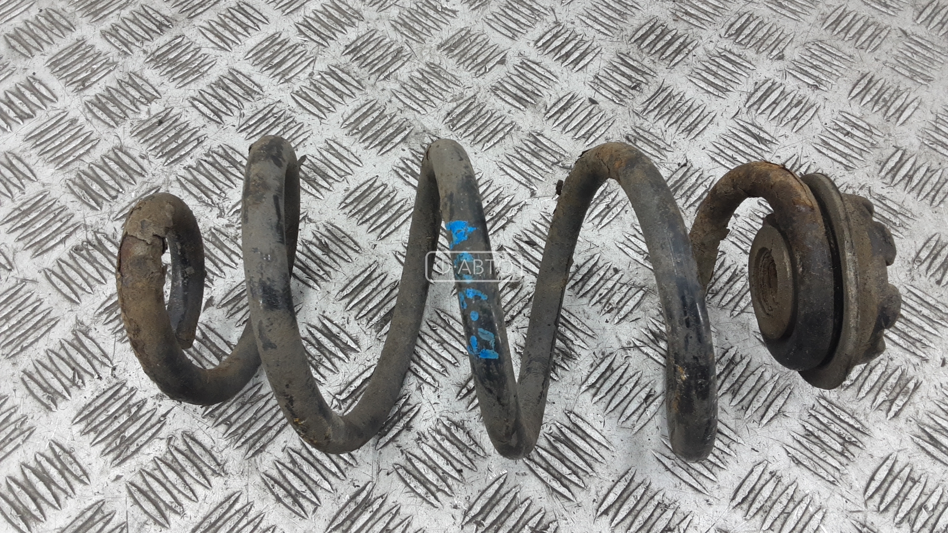 Пружина задняя