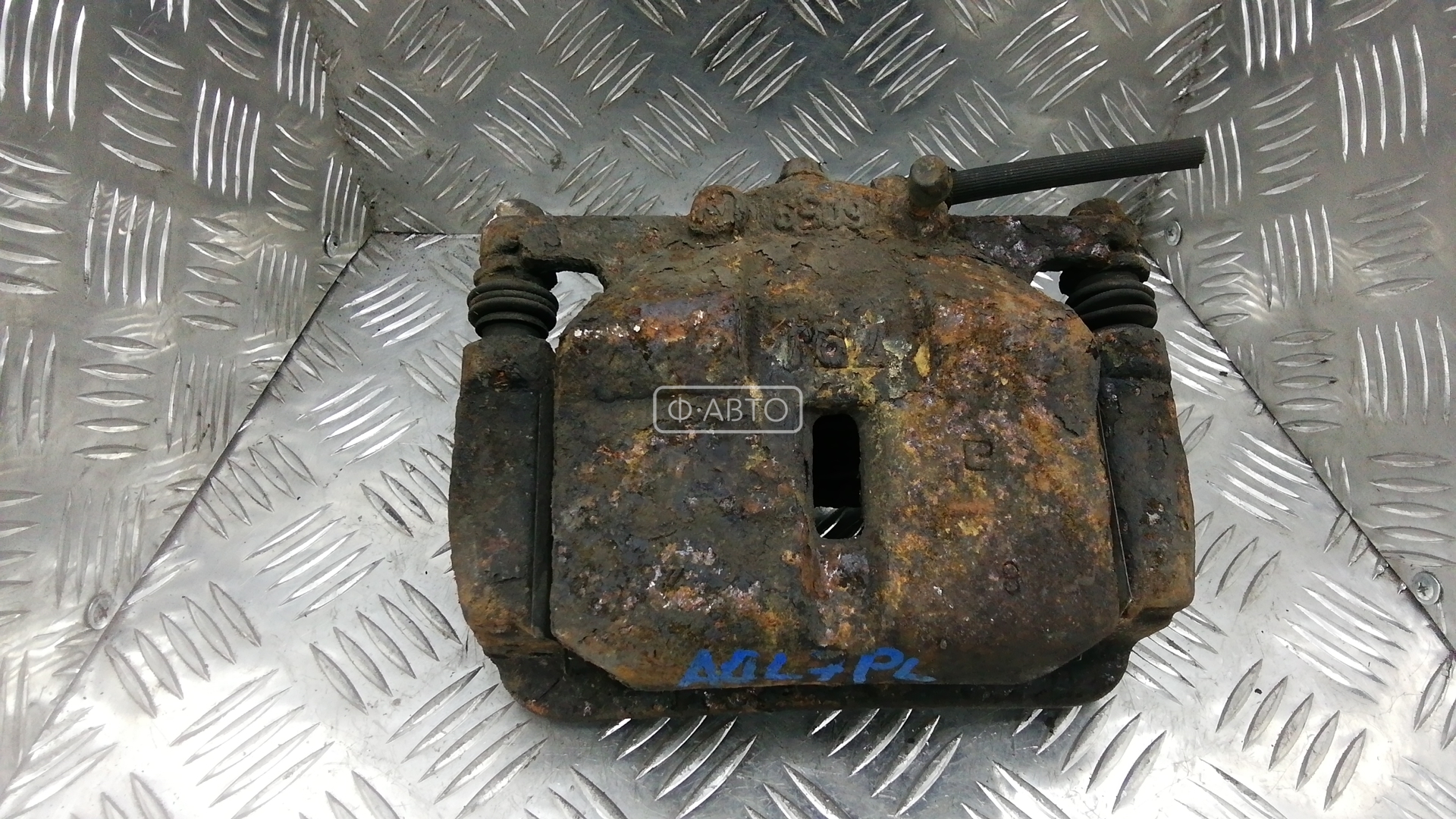 Суппорт тормозной передний левый