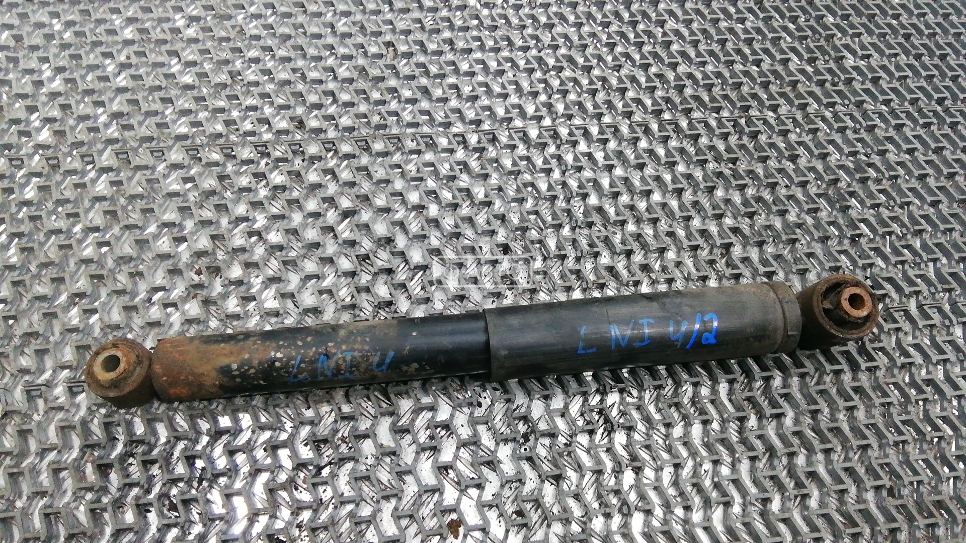 Амортизатор задней балки