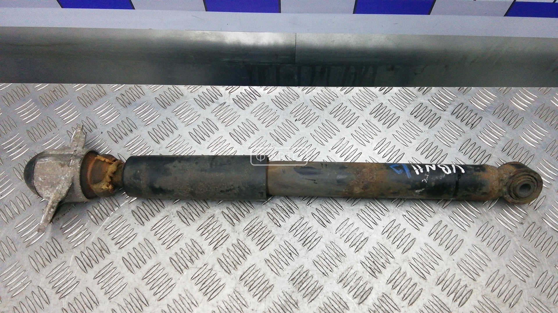 Амортизатор задней балки