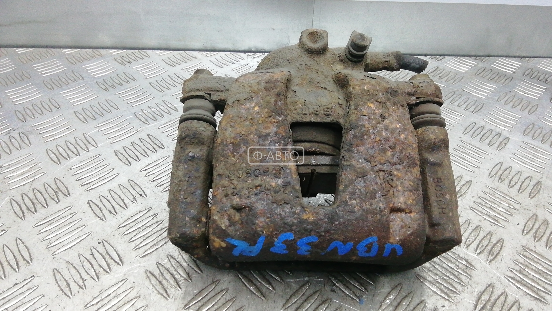 Суппорт тормозной передний левый