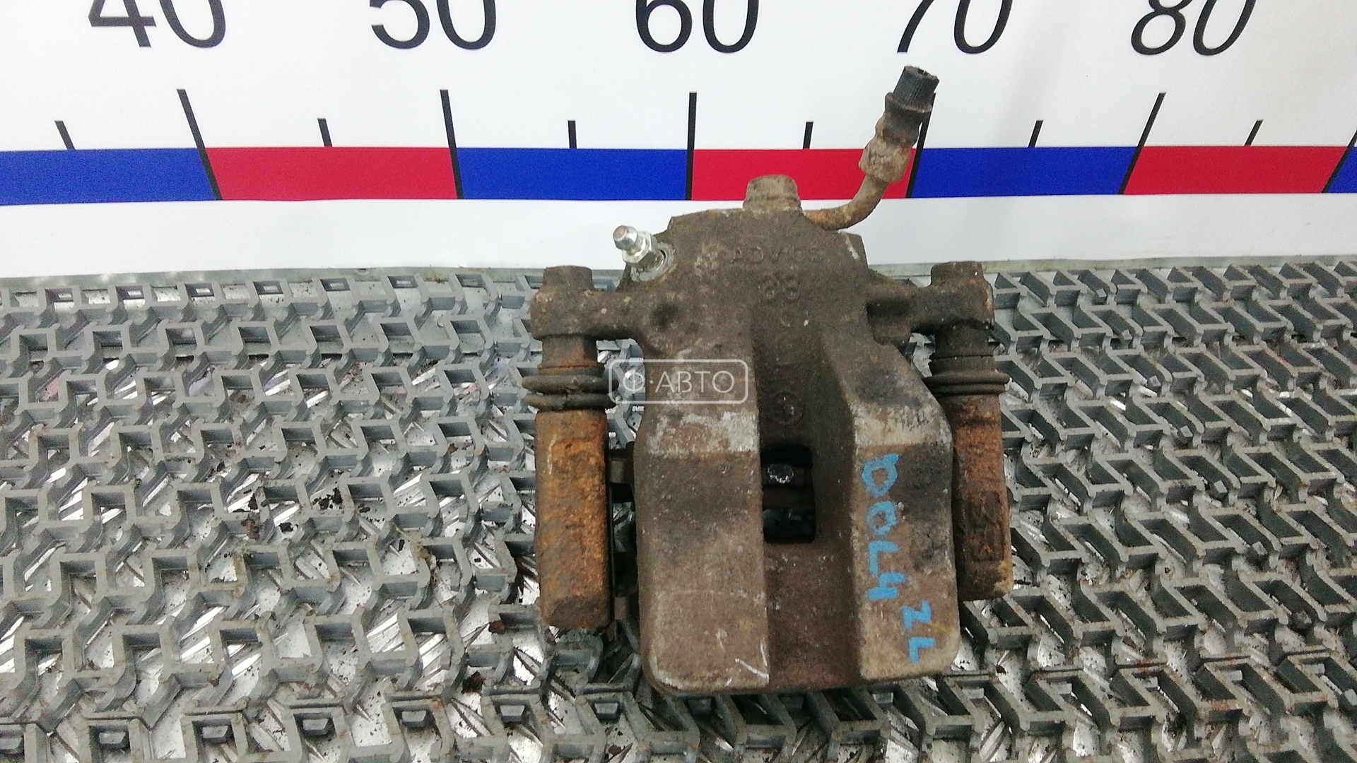 Суппорт тормозной задний левый