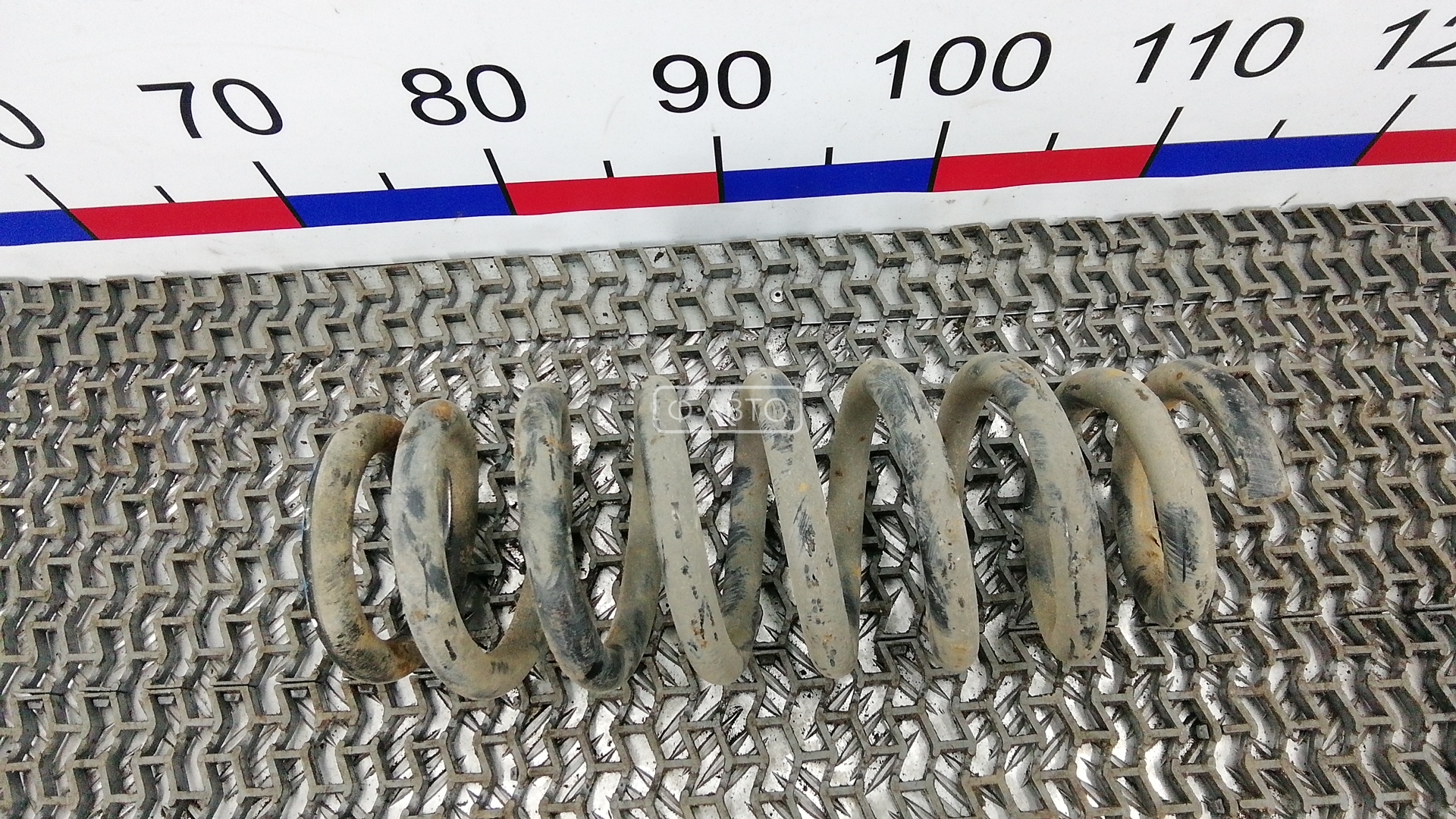 Пружина задняя