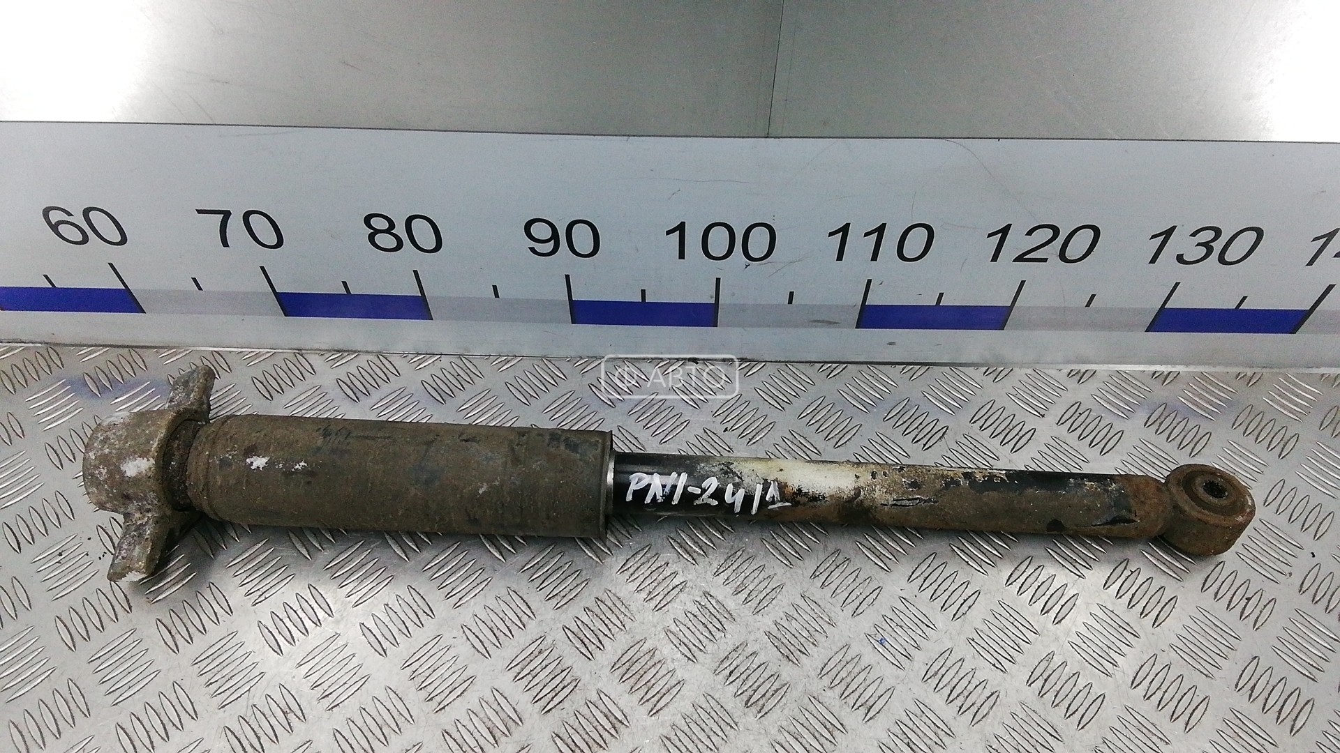 Амортизатор задней балки