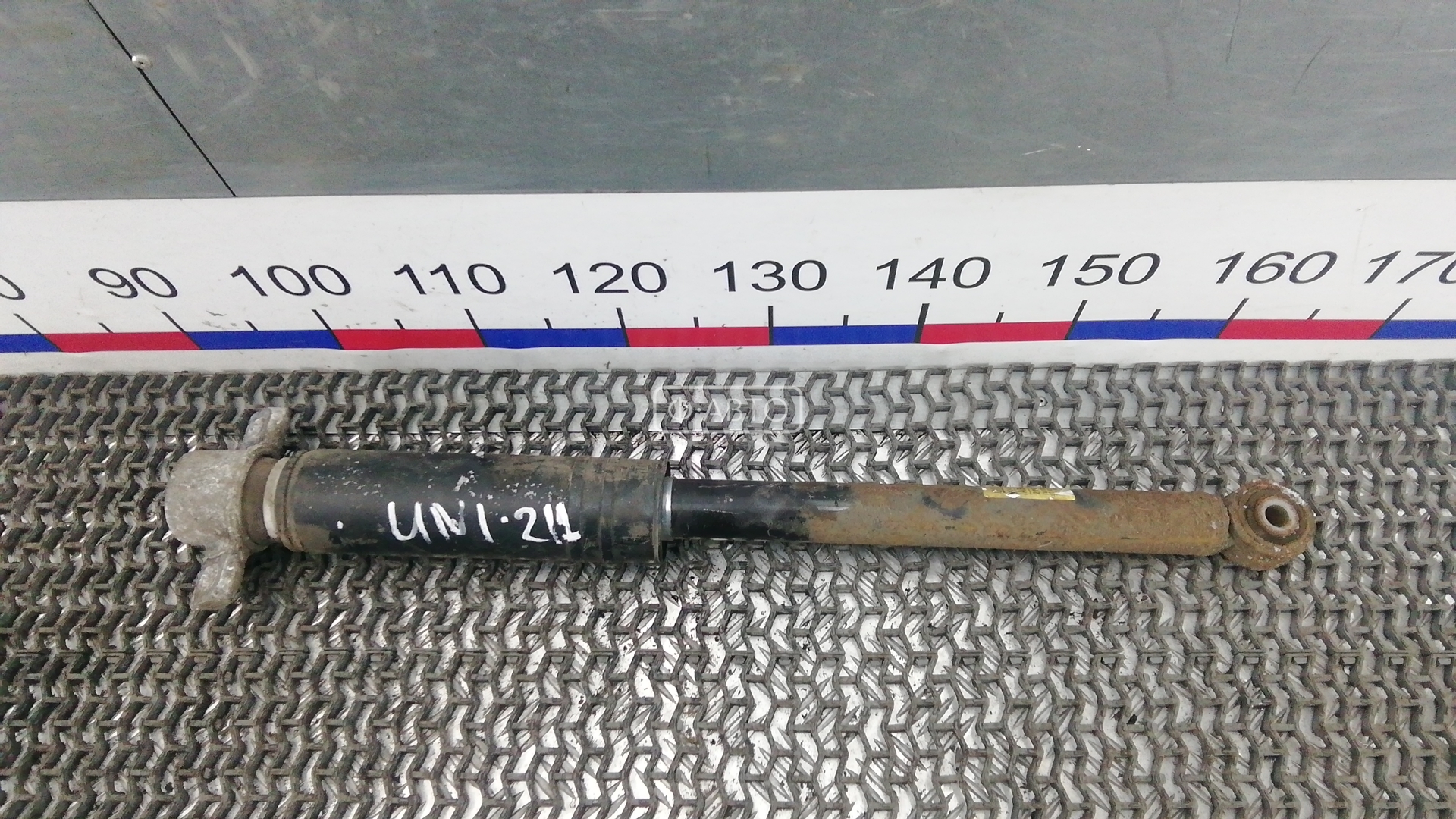 Амортизатор задней балки