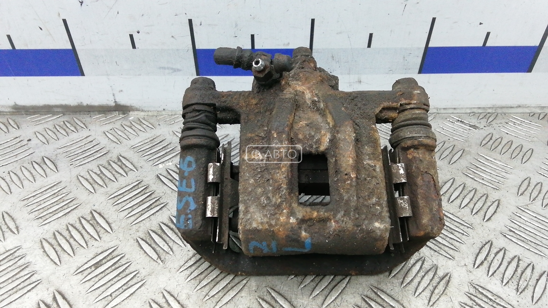 Суппорт тормозной задний левый