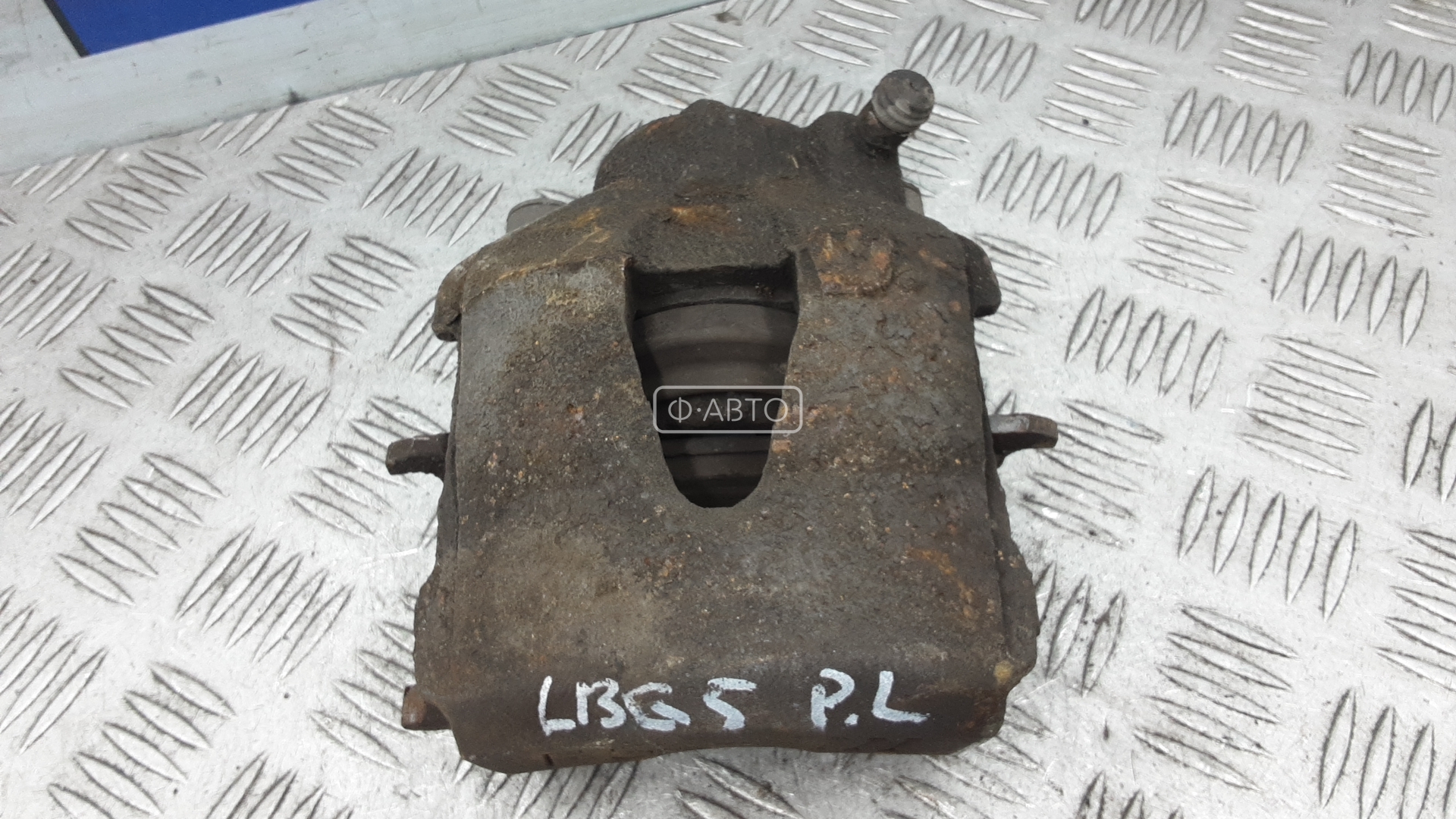 Суппорт тормозной передний левый