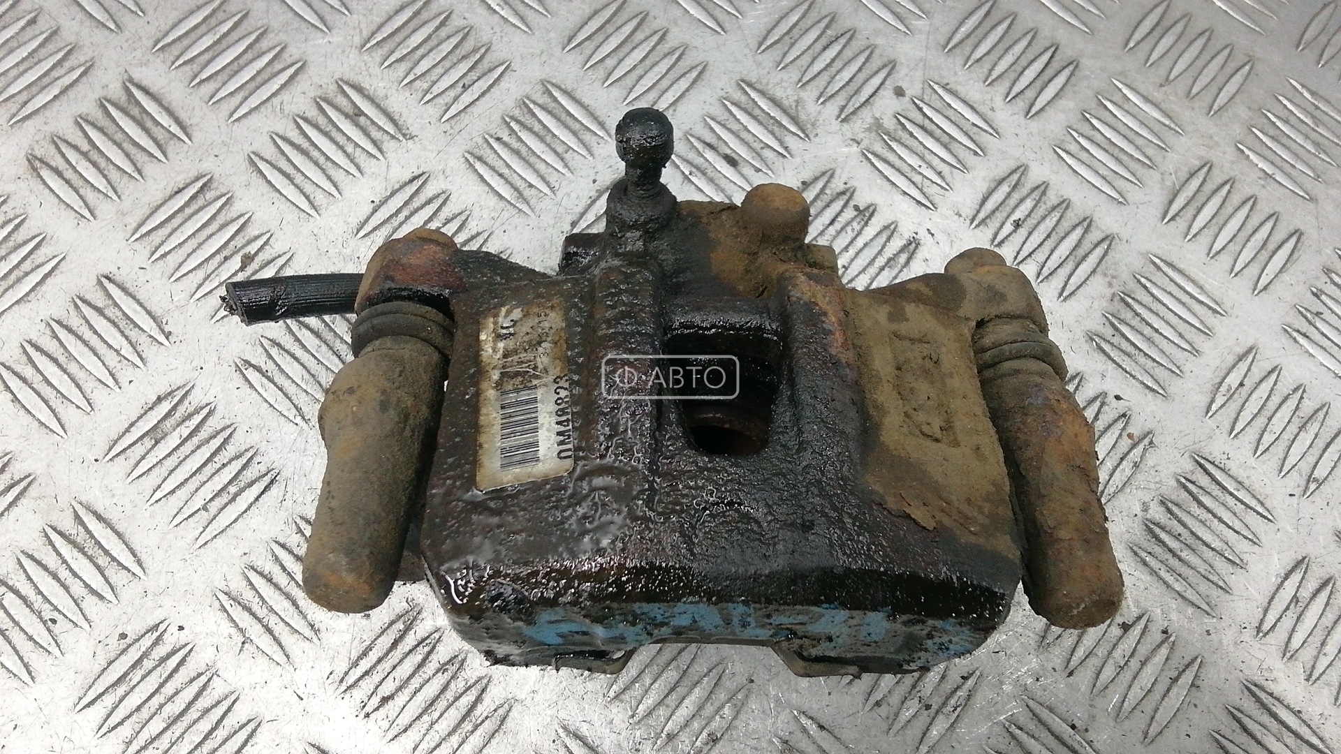 Суппорт тормозной задний левый