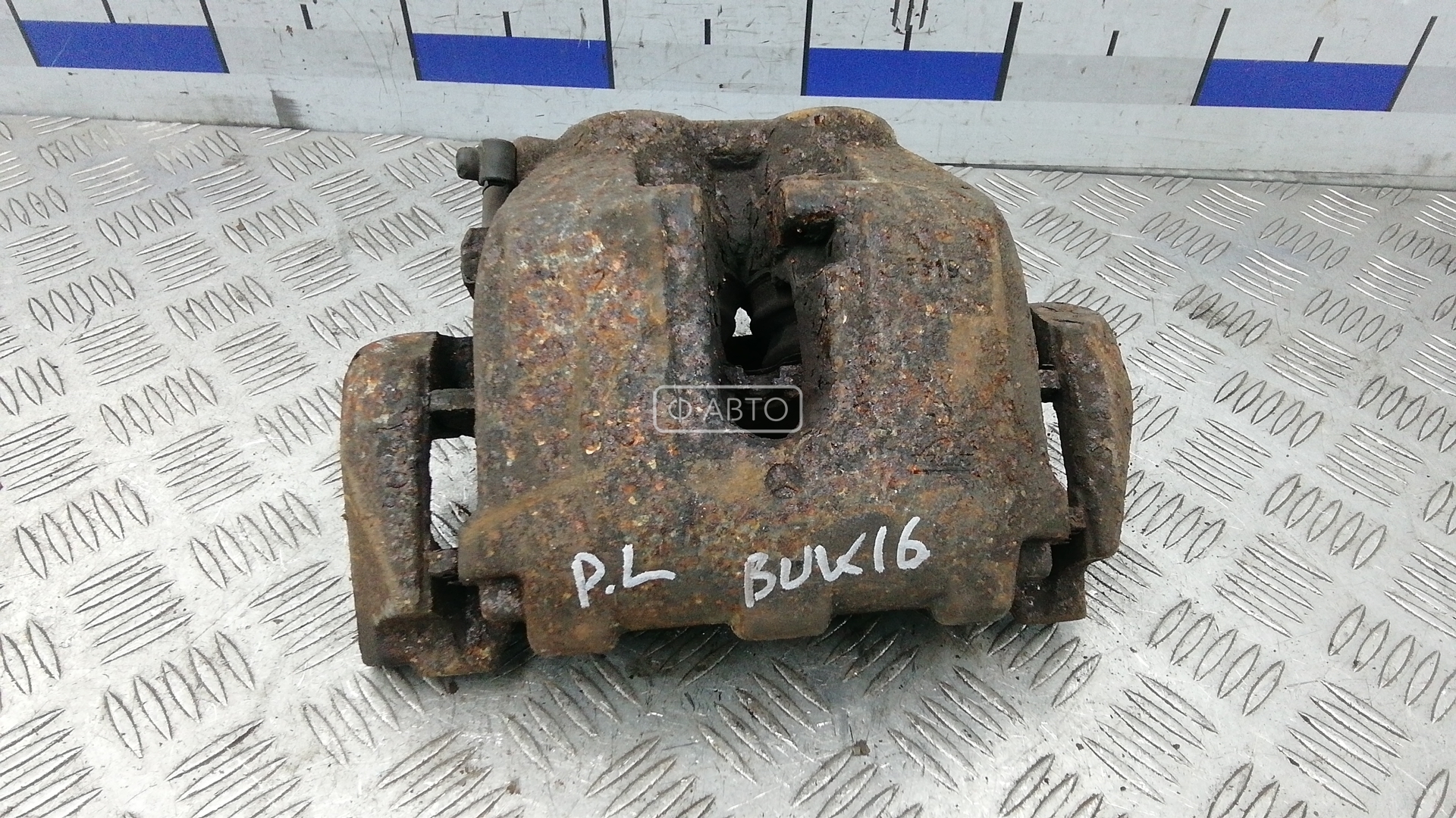 Суппорт тормозной передний левый