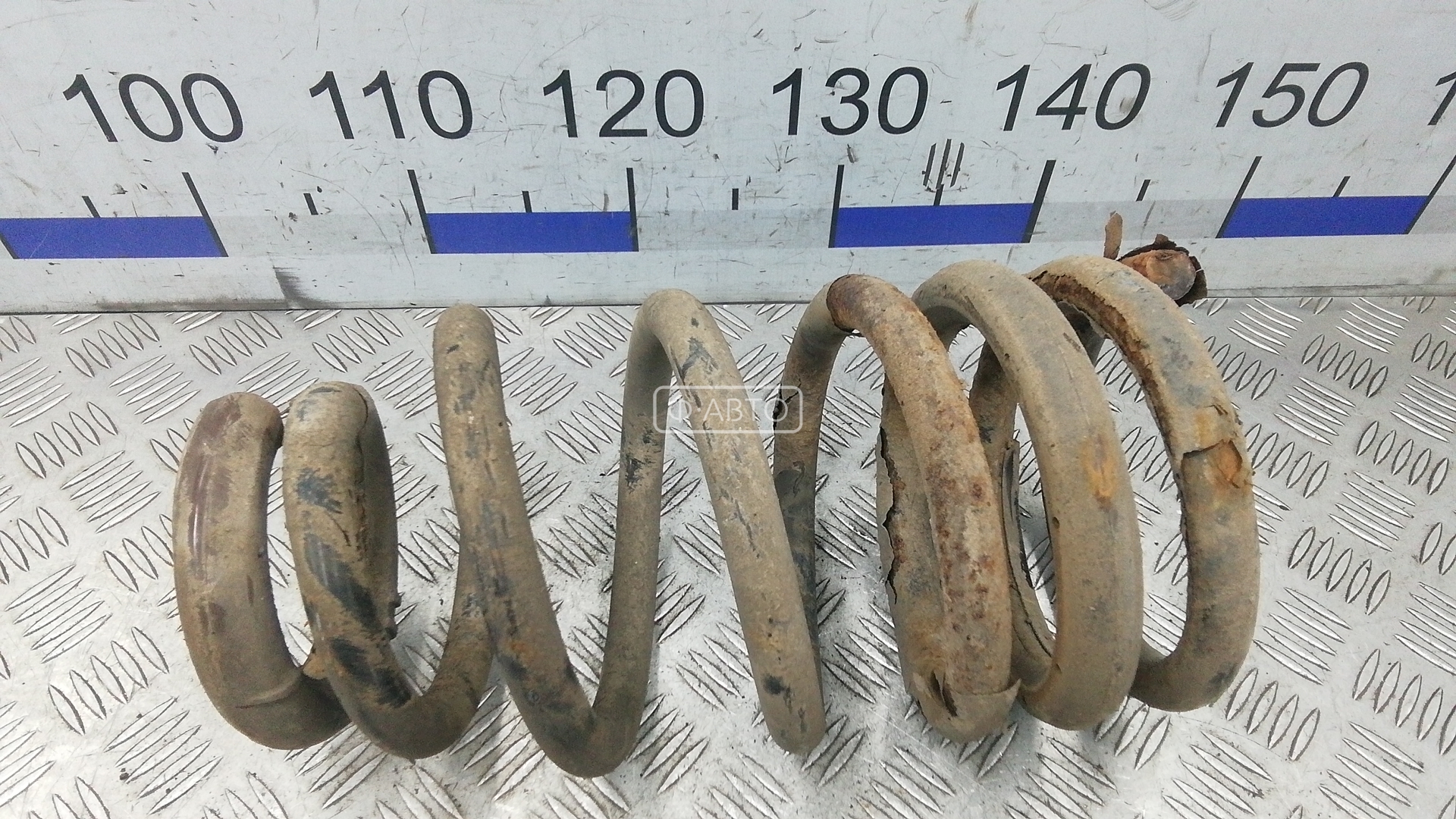 Пружина задняя