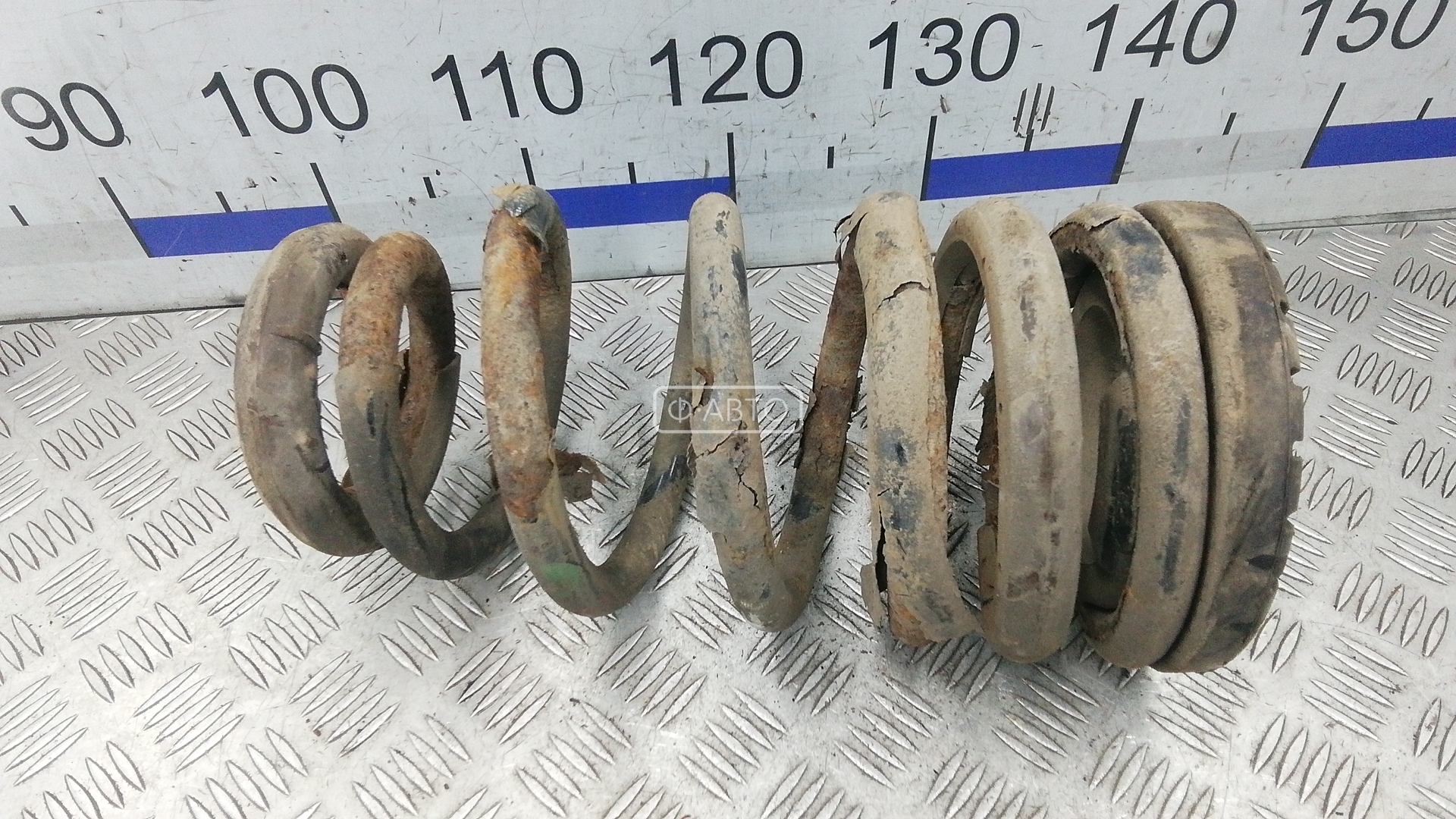 Пружина задняя