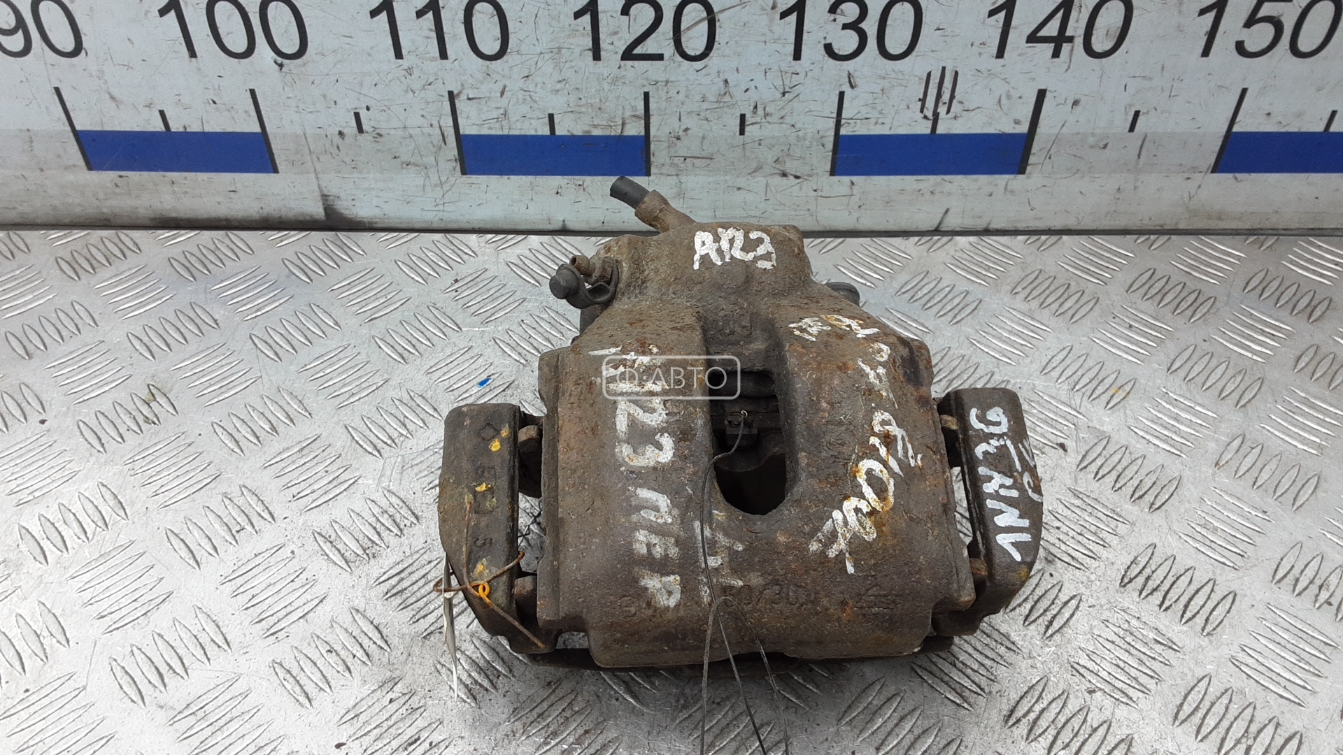 Суппорт тормозной передний левый