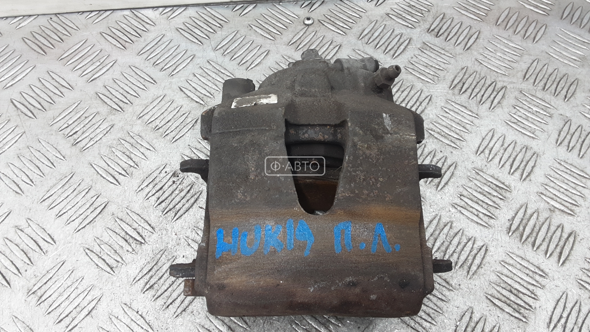 Суппорт тормозной передний левый