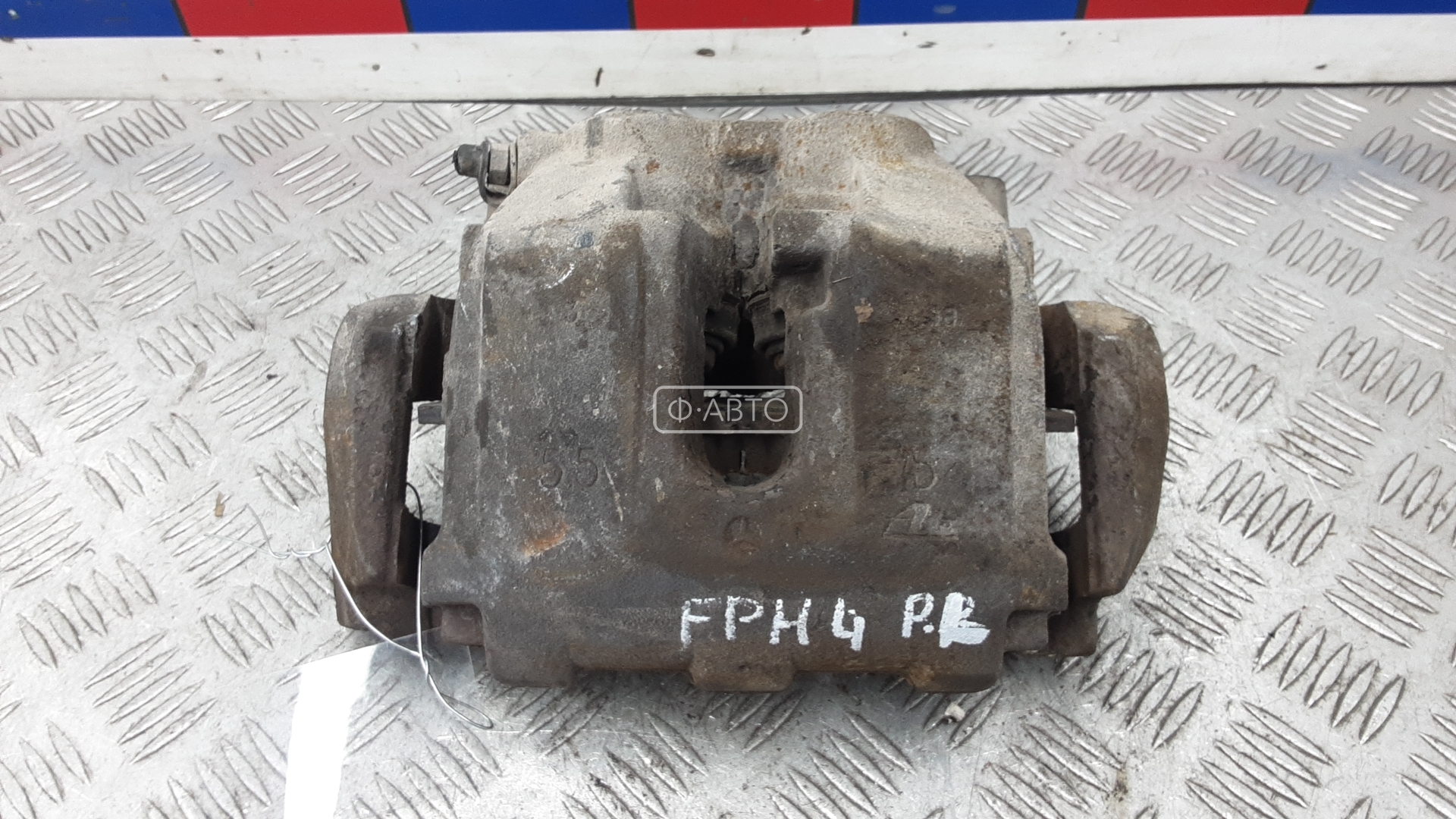 Суппорт тормозной передний левый