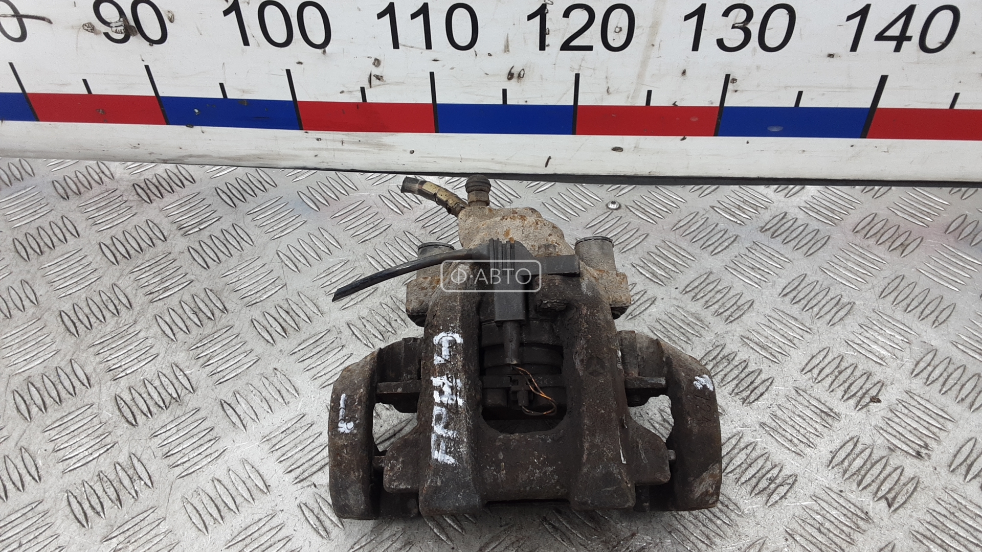 Суппорт тормозной задний левый