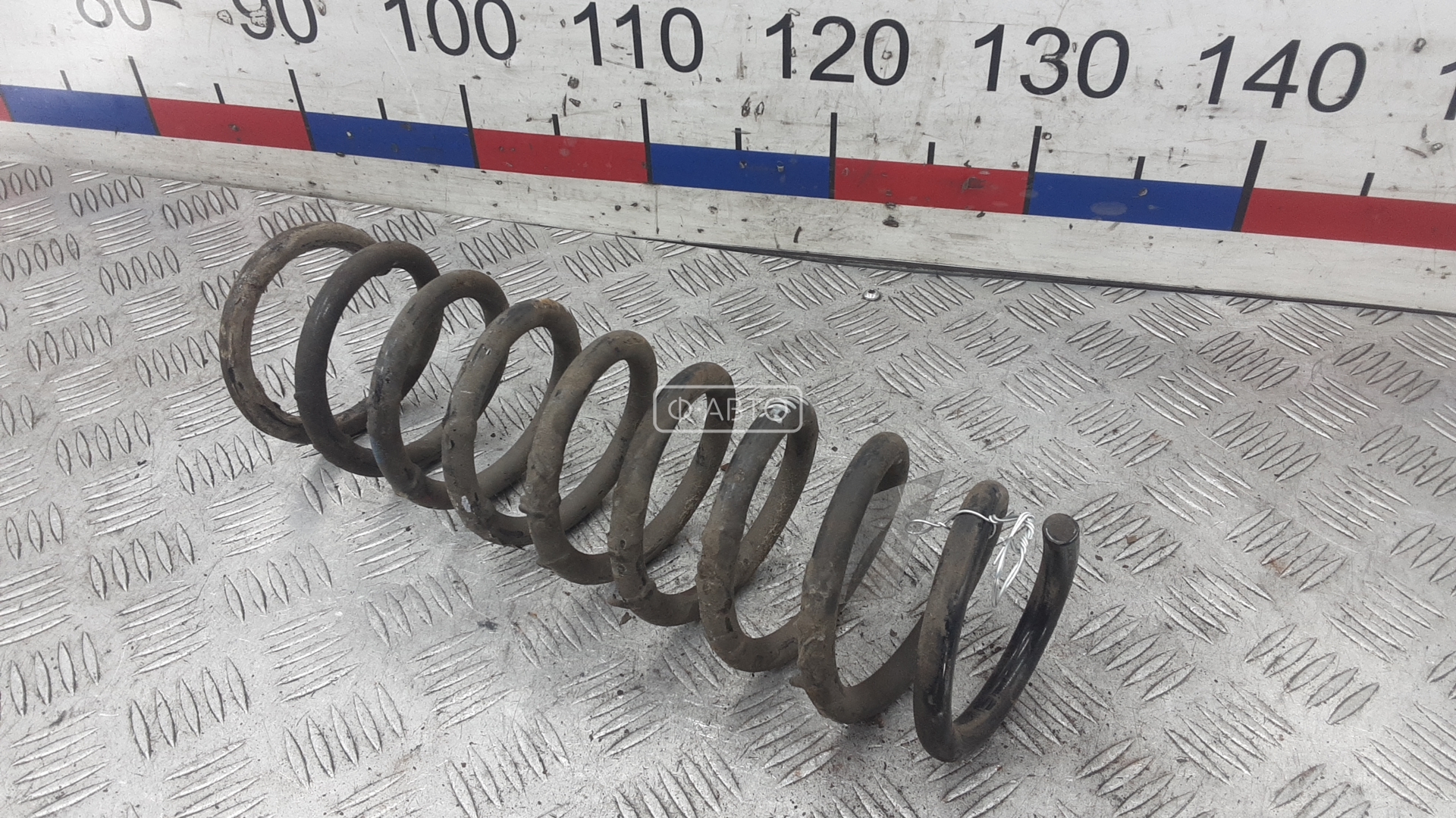 Пружина задняя