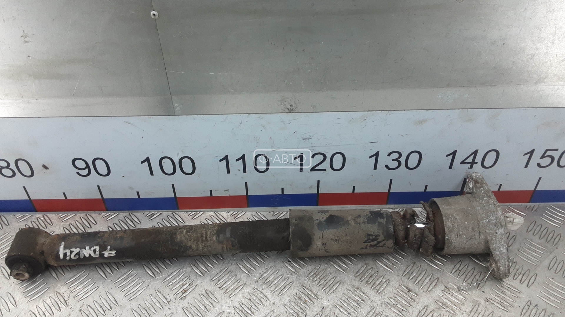 Амортизатор задней балки