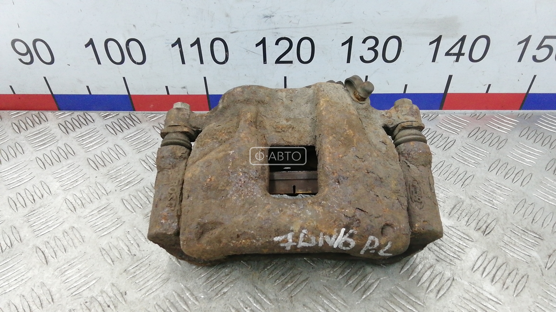 Суппорт тормозной передний левый