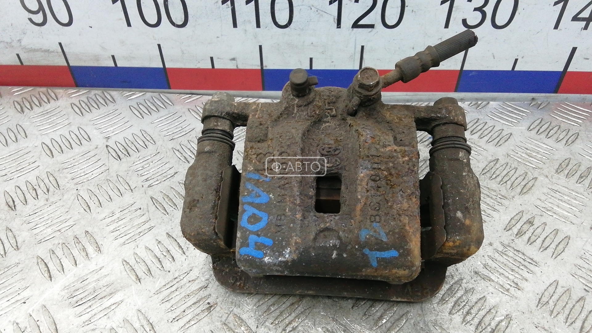 Суппорт тормозной задний левый