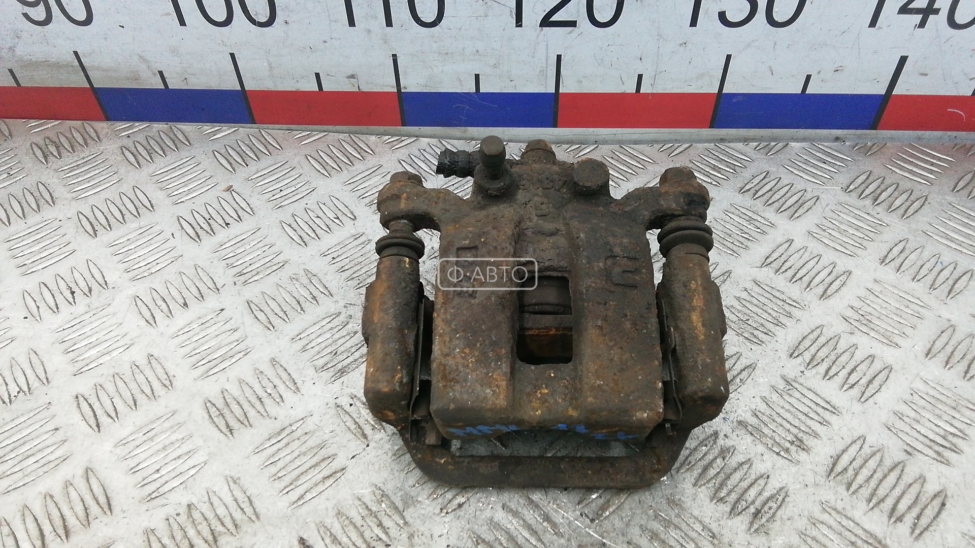 Суппорт тормозной задний левый