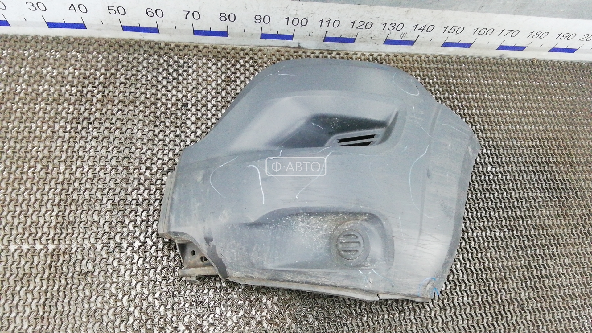 Клык бампера передний левый